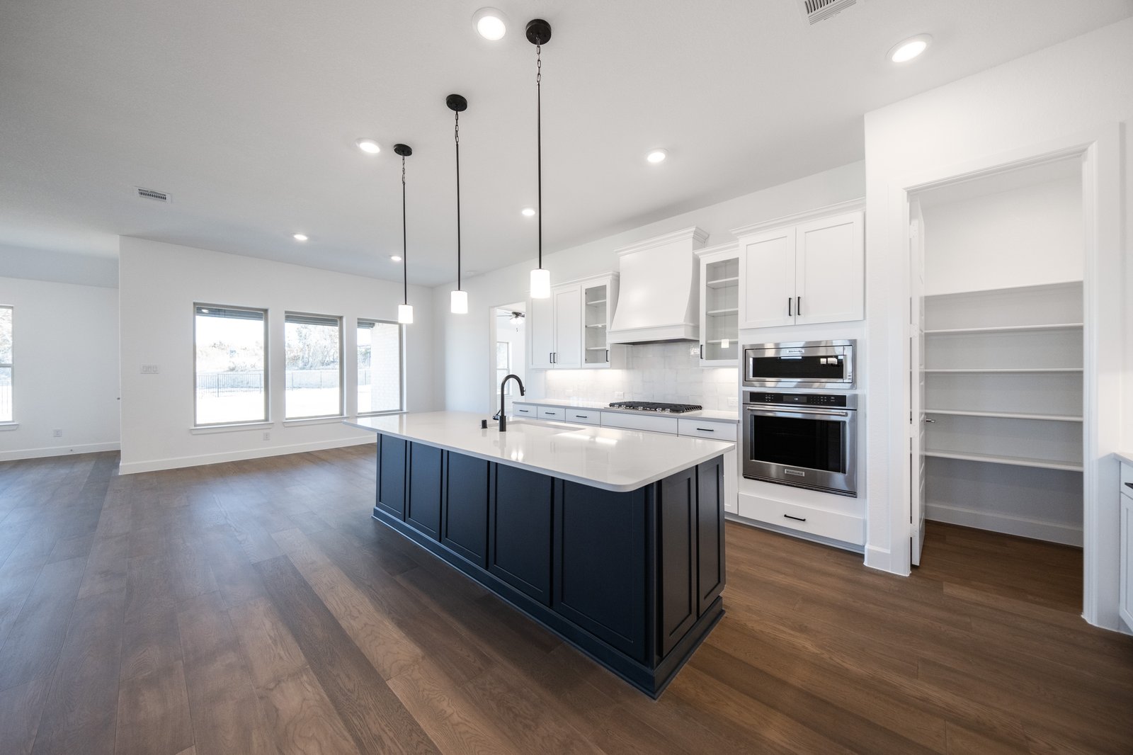 kitchen with large island and white countertops