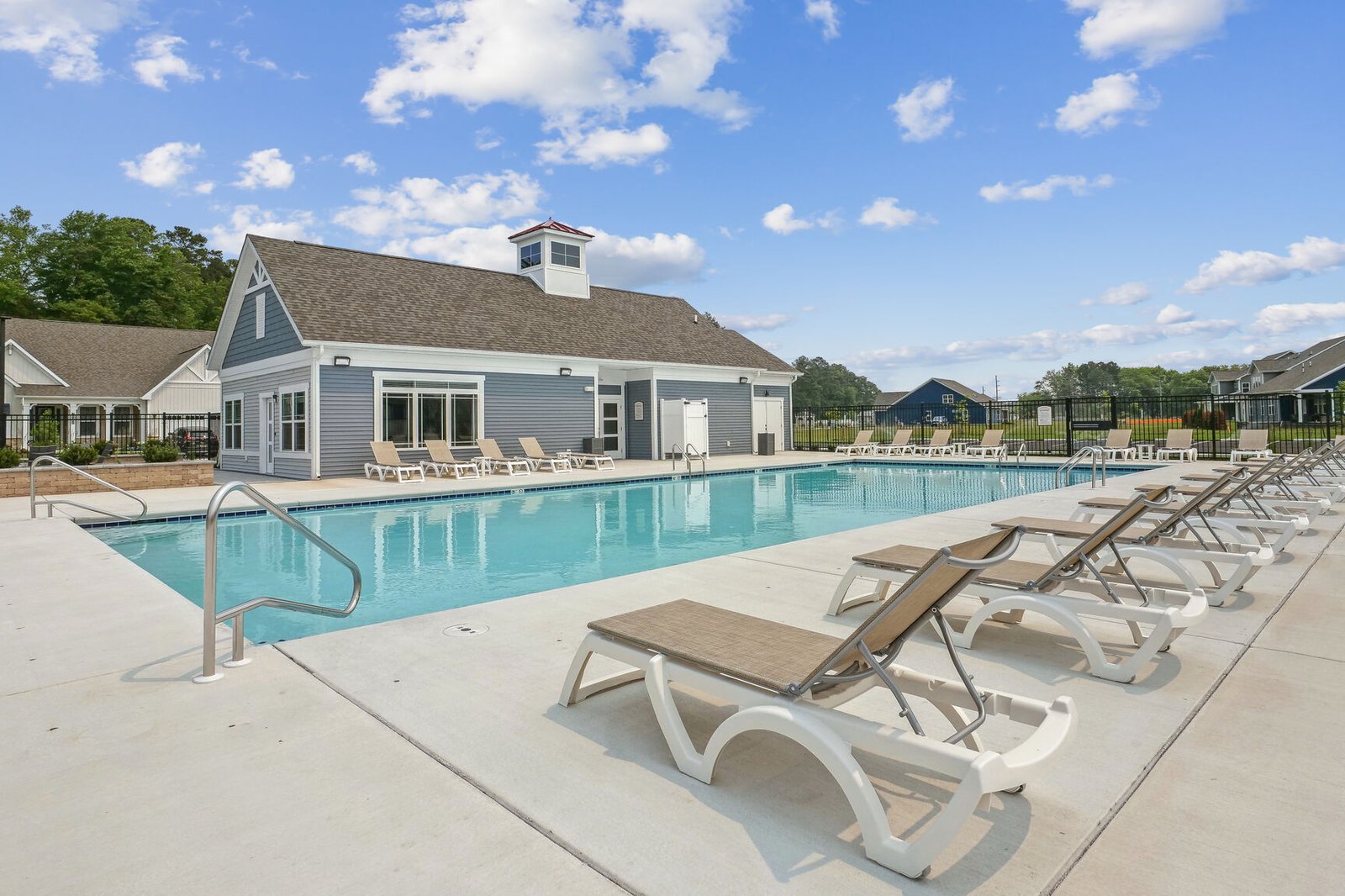 pool with lounge chairs