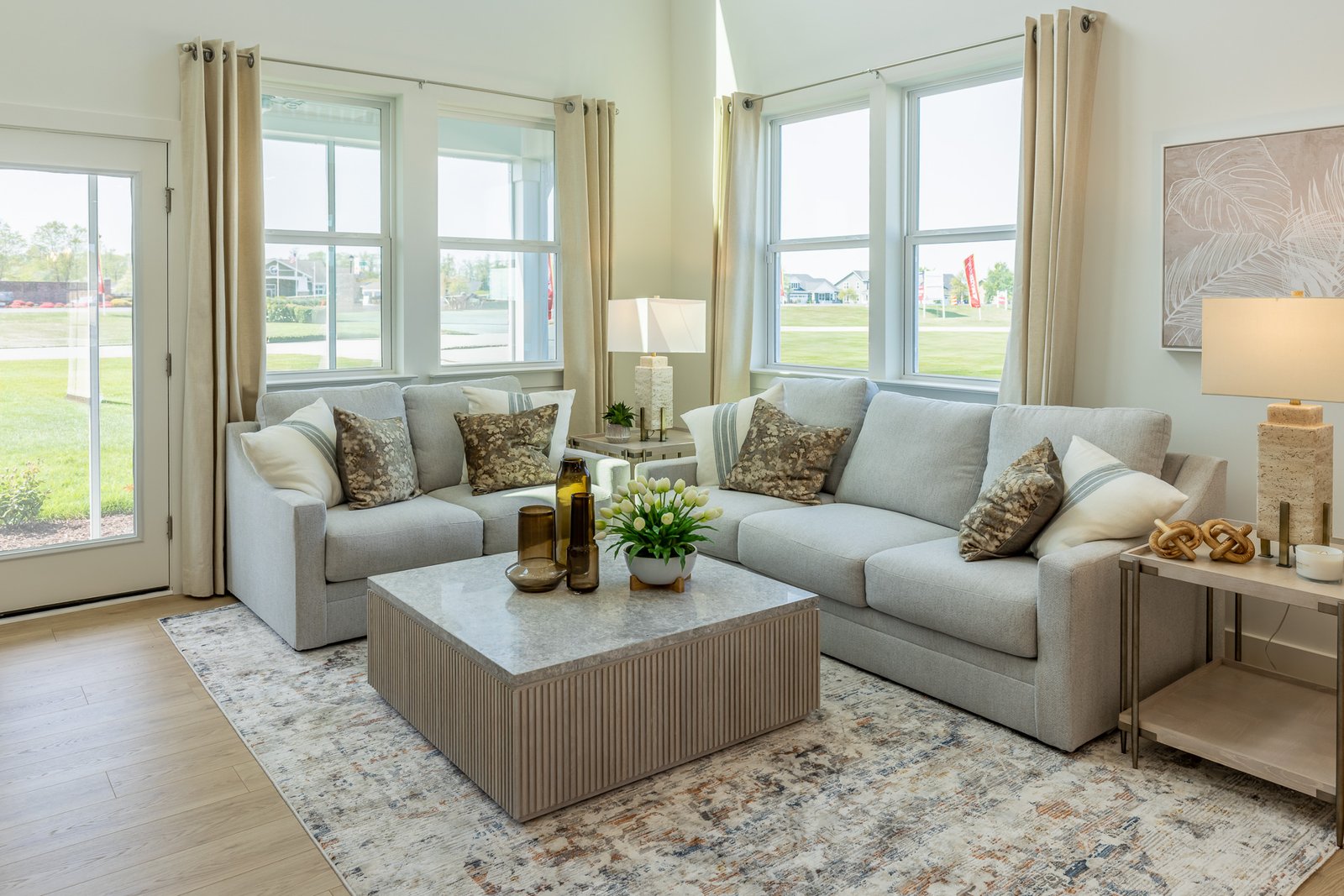 great room with seating and an abundance of natural light