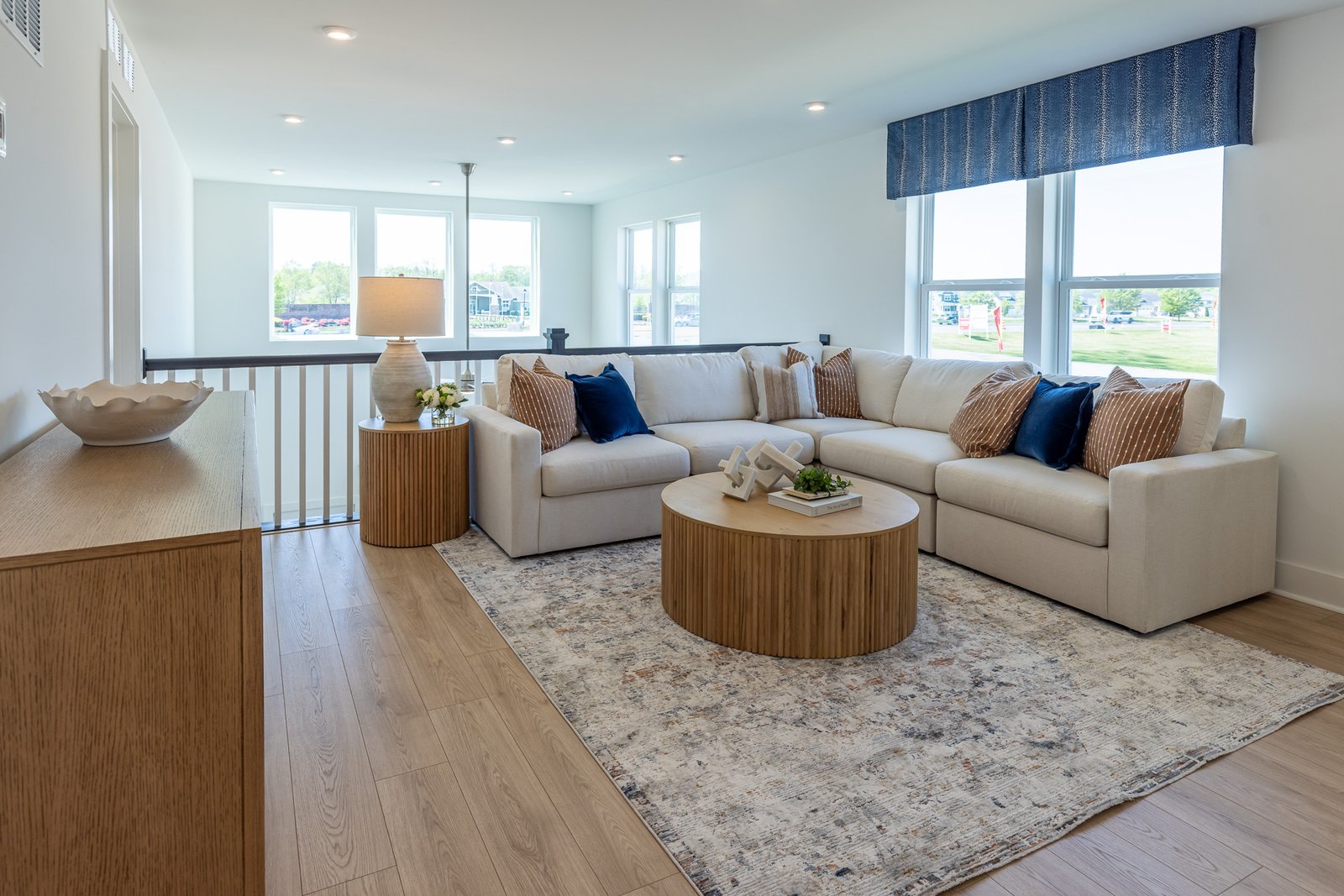 2nd-floor loft with a sectional couch