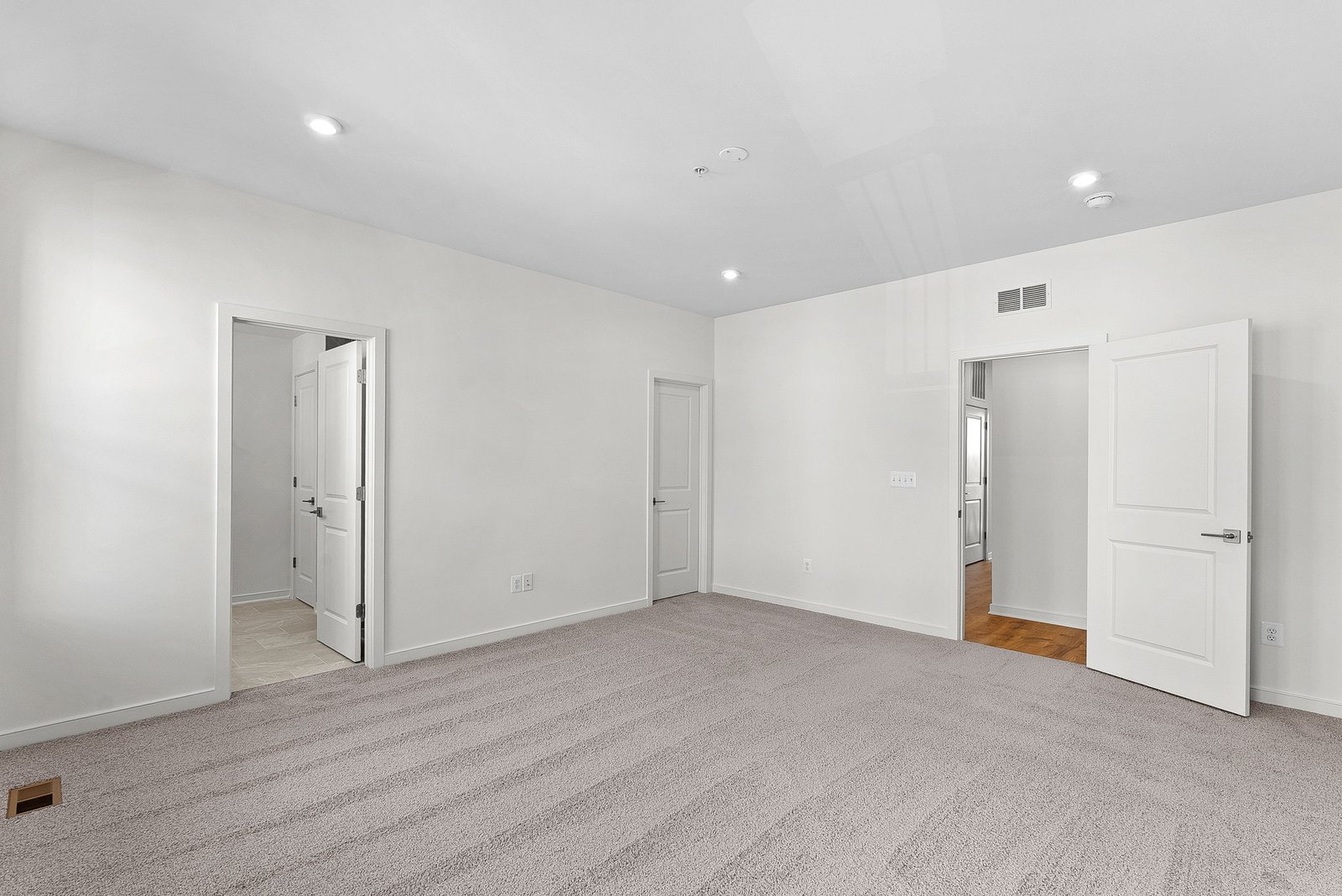 primary bedroom with carpet