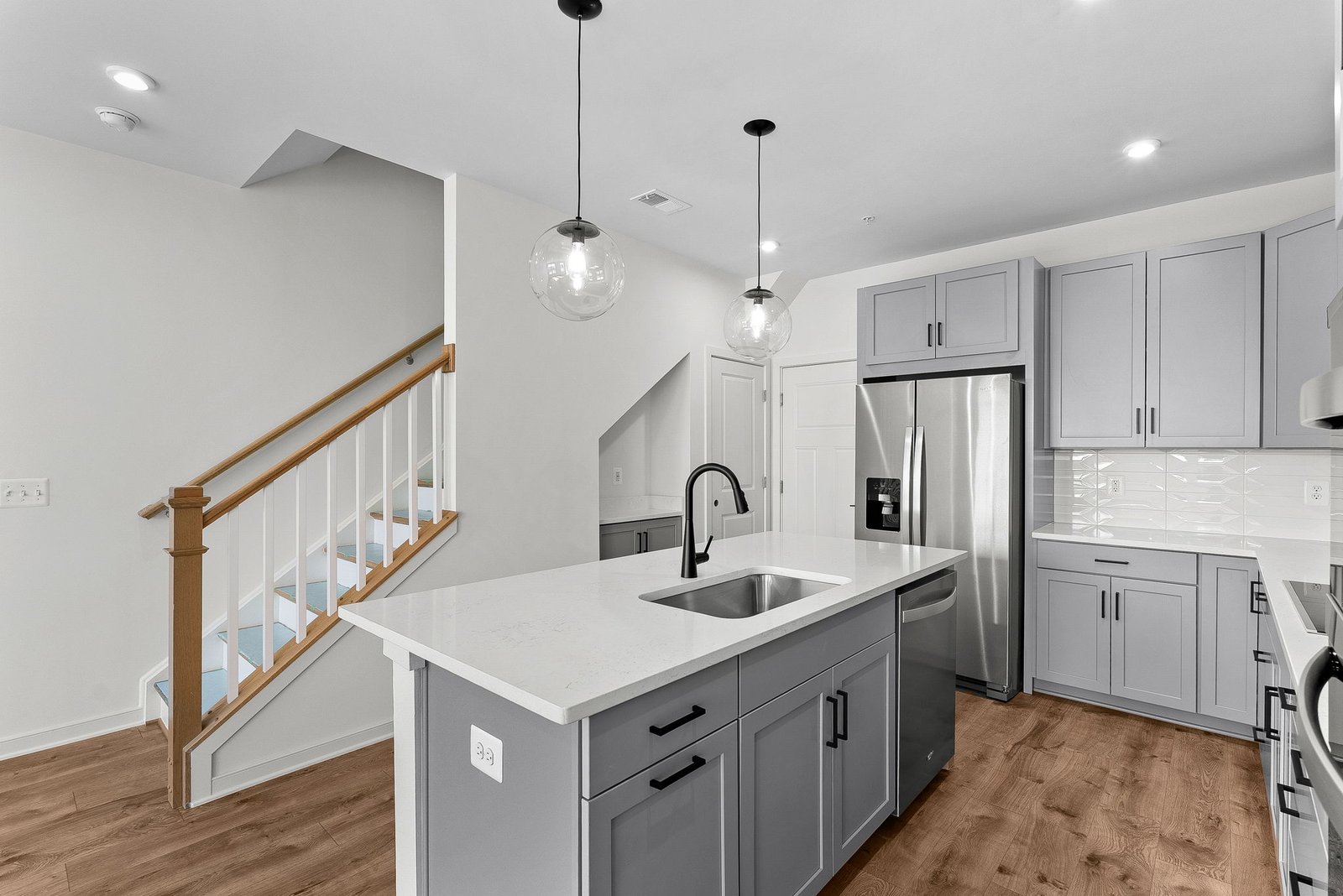 kitchen with gray cabinetry