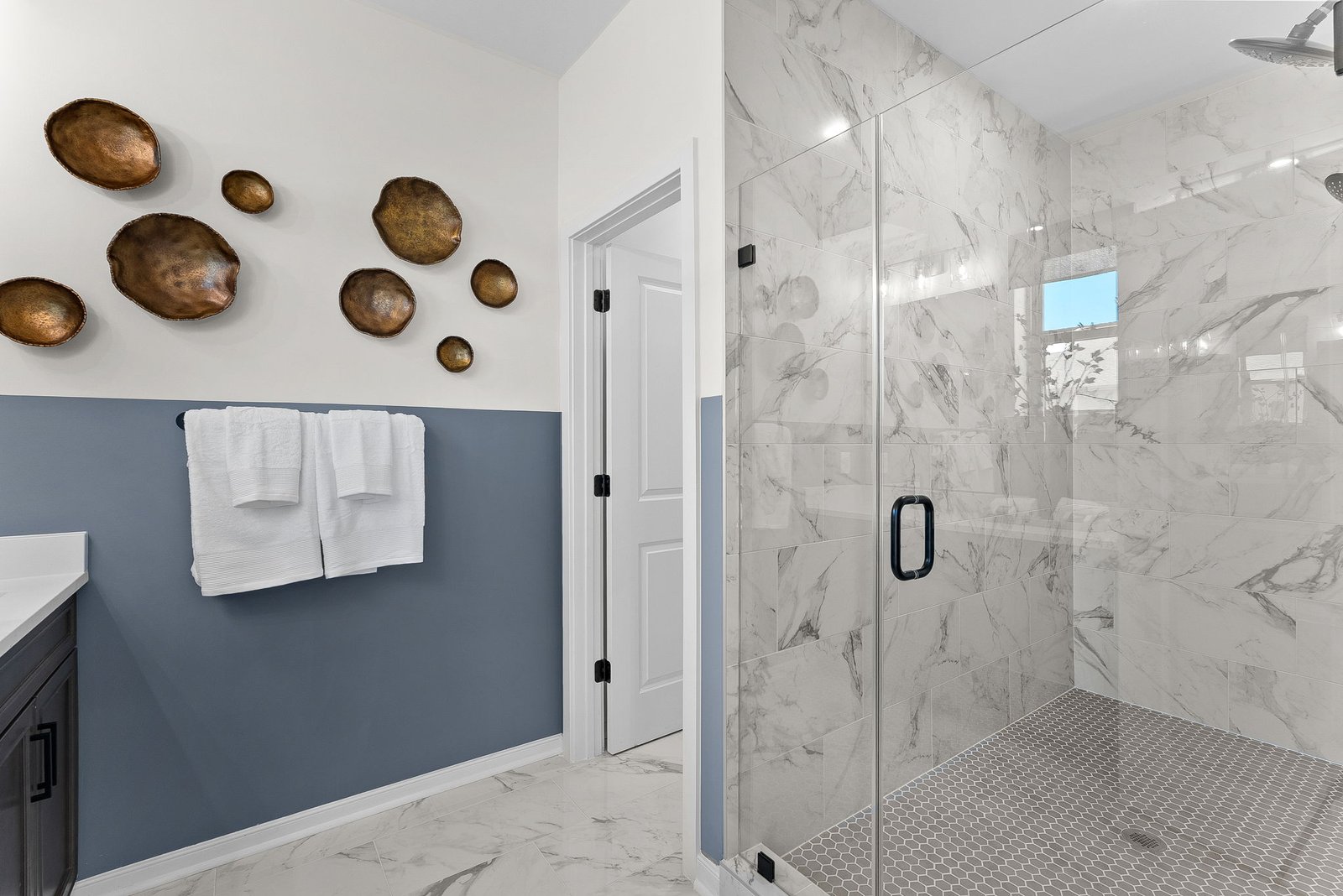 primary bathroom with an oversized shower
