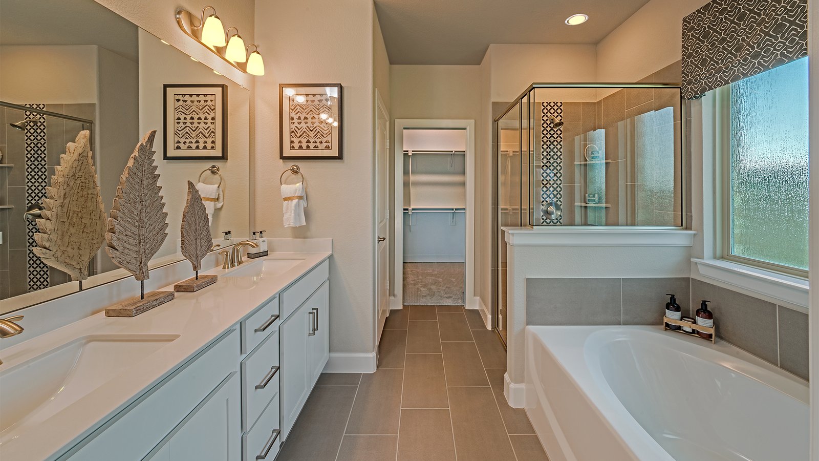 primary bathroom with soaking tub and shower