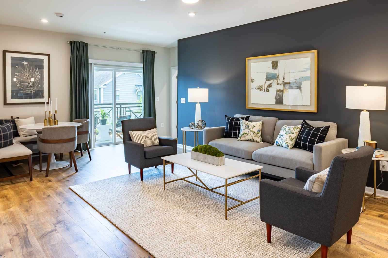 great room with a dark accent wall