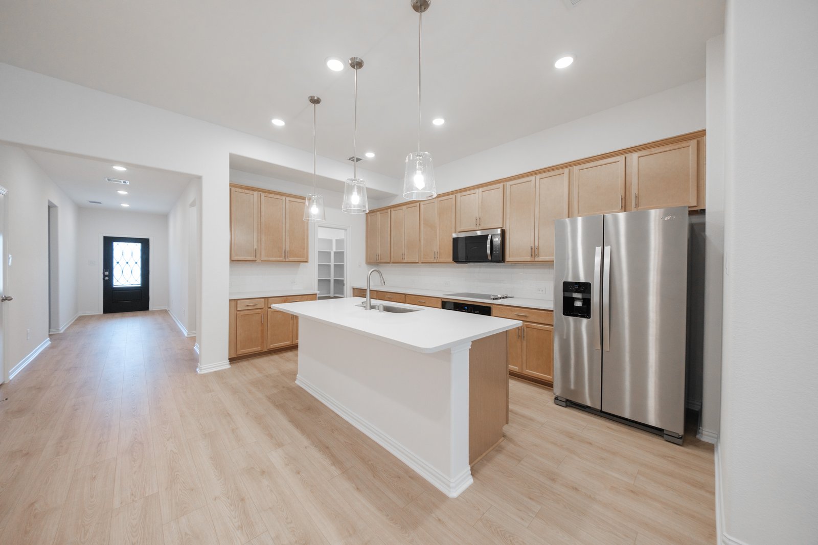 kitchen with large island and white countertops 