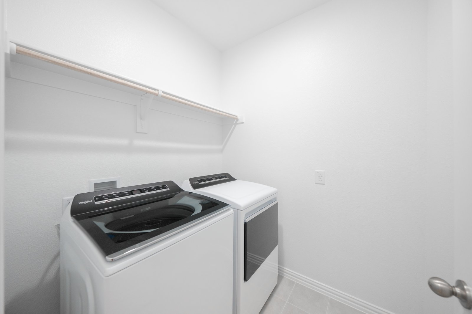 laundry room with washer and dryer
