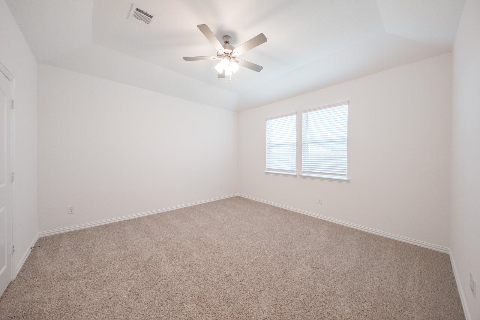 bedroom with carpet and ceiling fan 