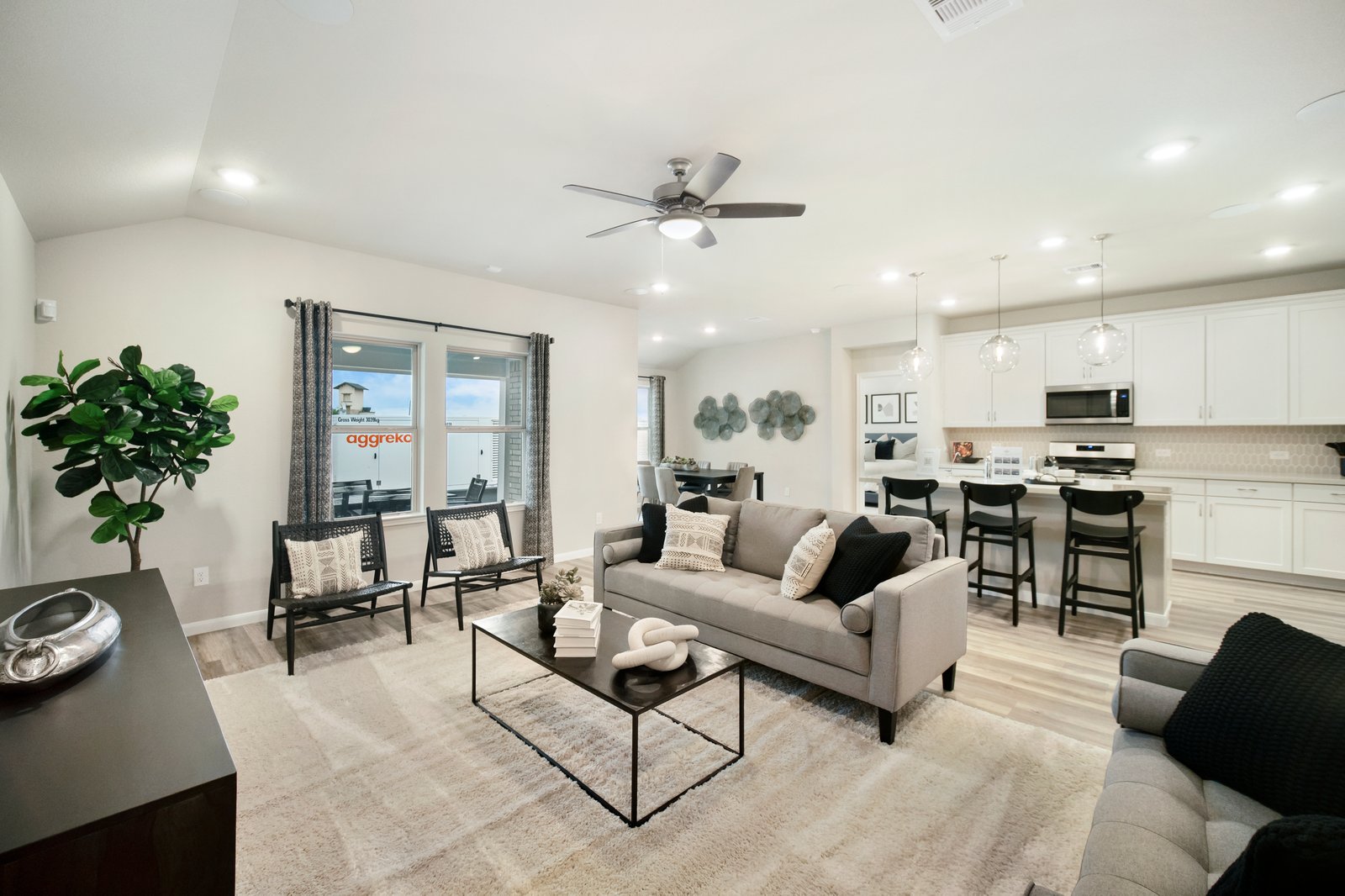large great room with hardwood flooring