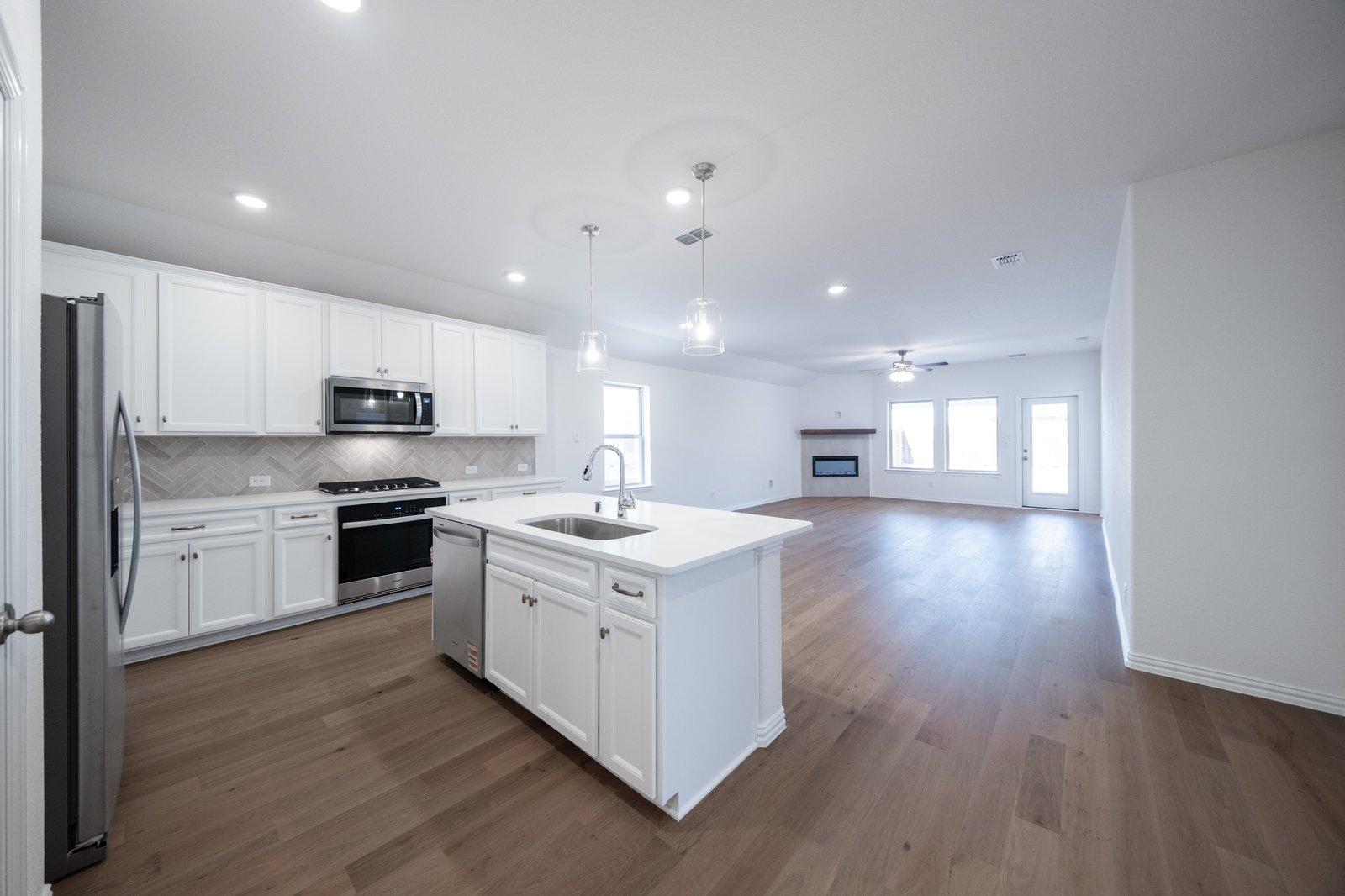 kitchen with large island and white countertops