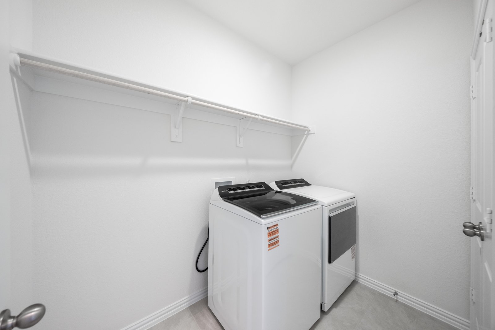 laundry room with washer and dryer