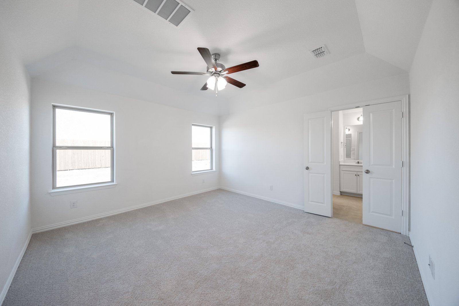 bedroom with carpet and ceiling fan