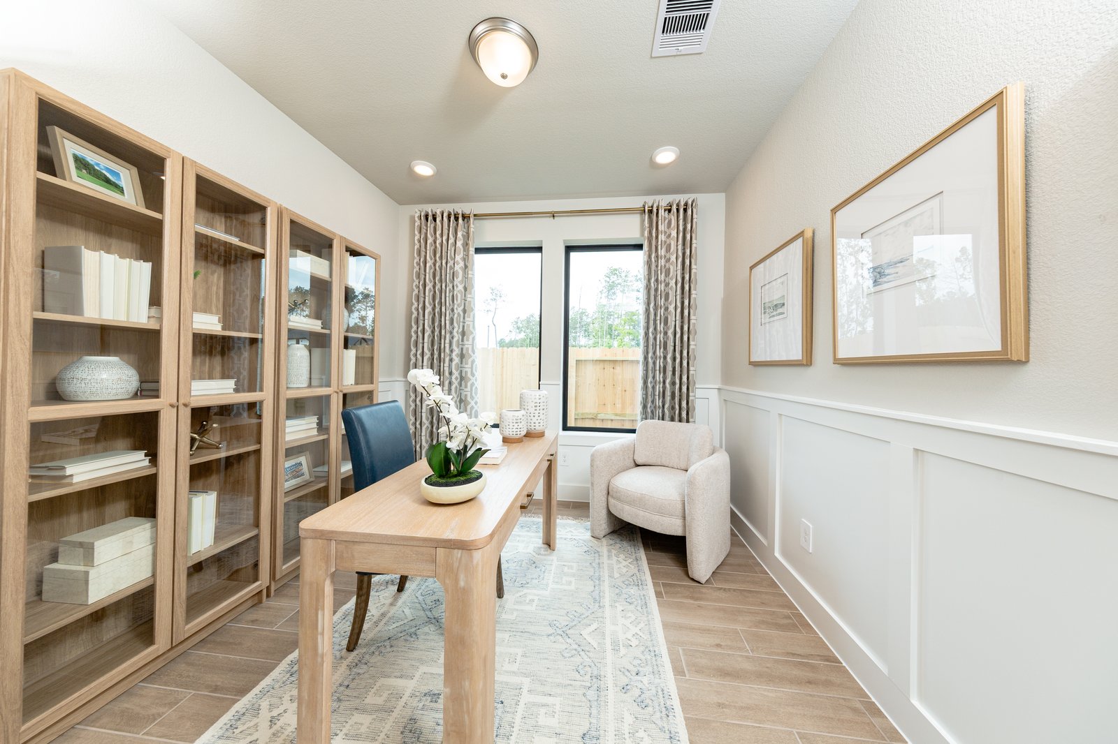 private study with hardwood flooring