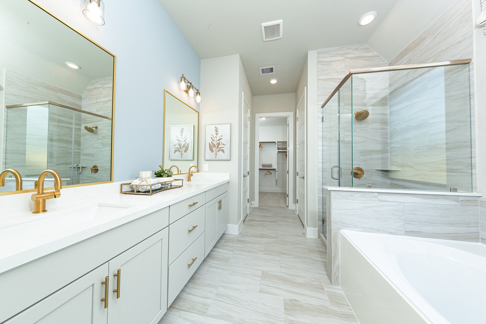 primary bathroom with soaking tub and shower