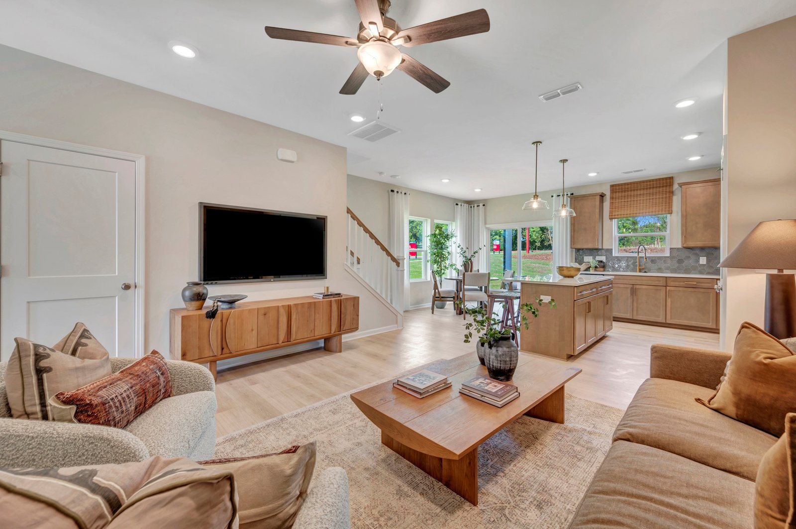 great room with a mounted television