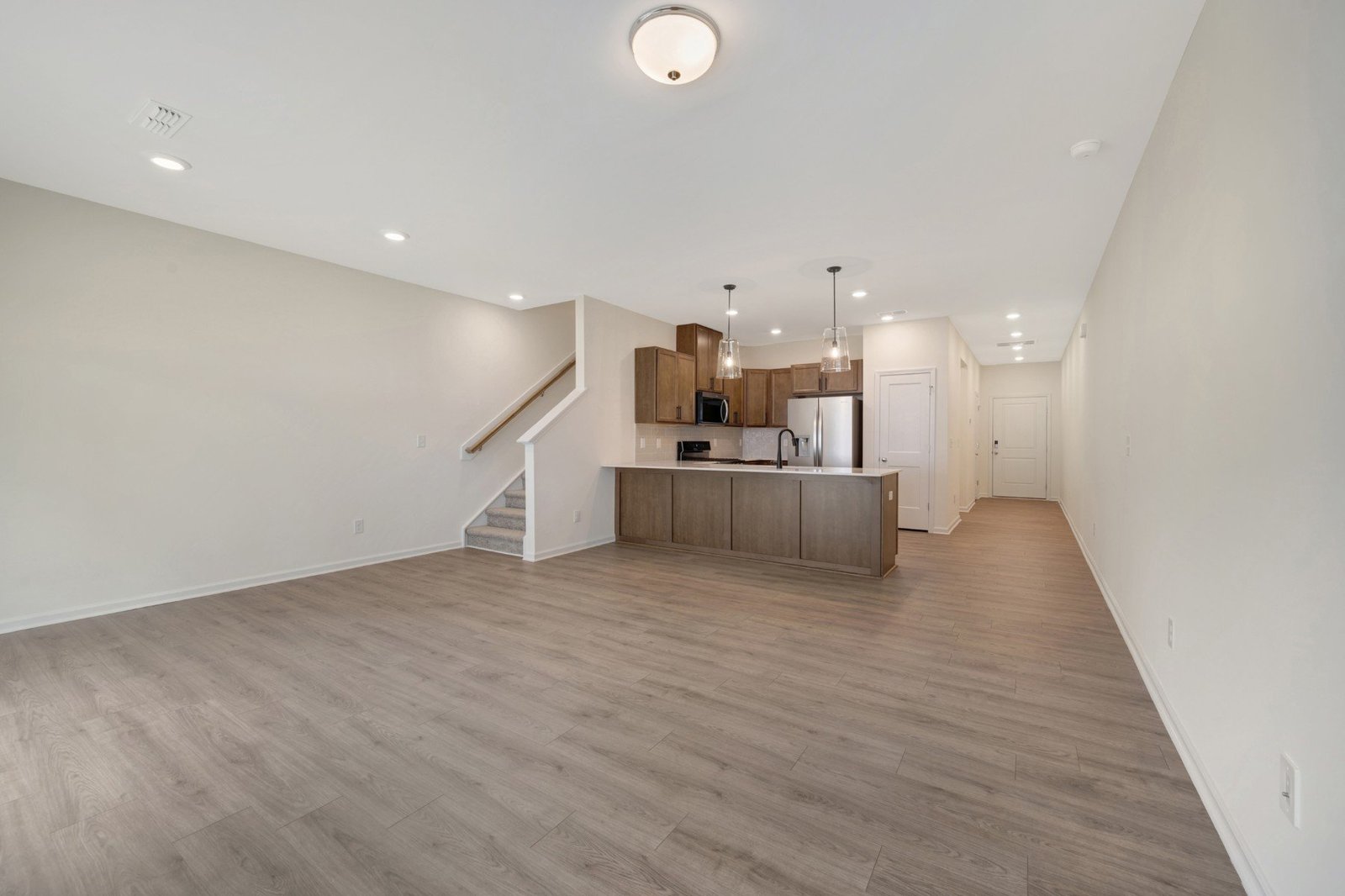 great room with a view of the kitchen