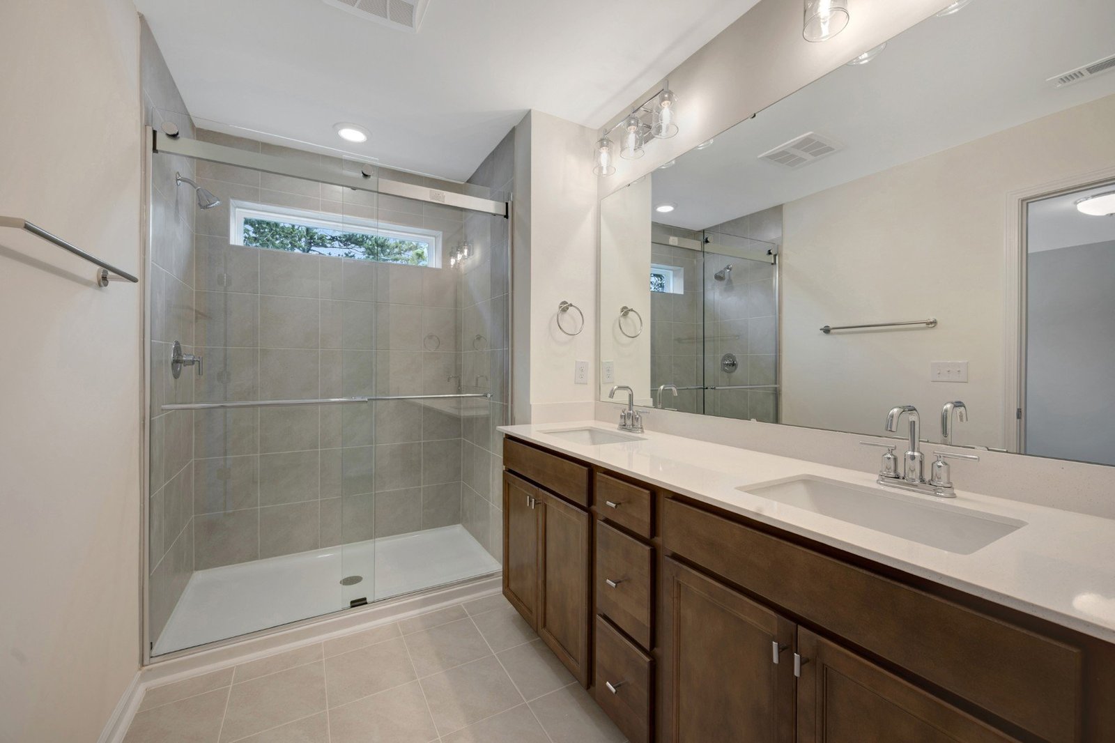 primary bath with an oversized shower with a window
