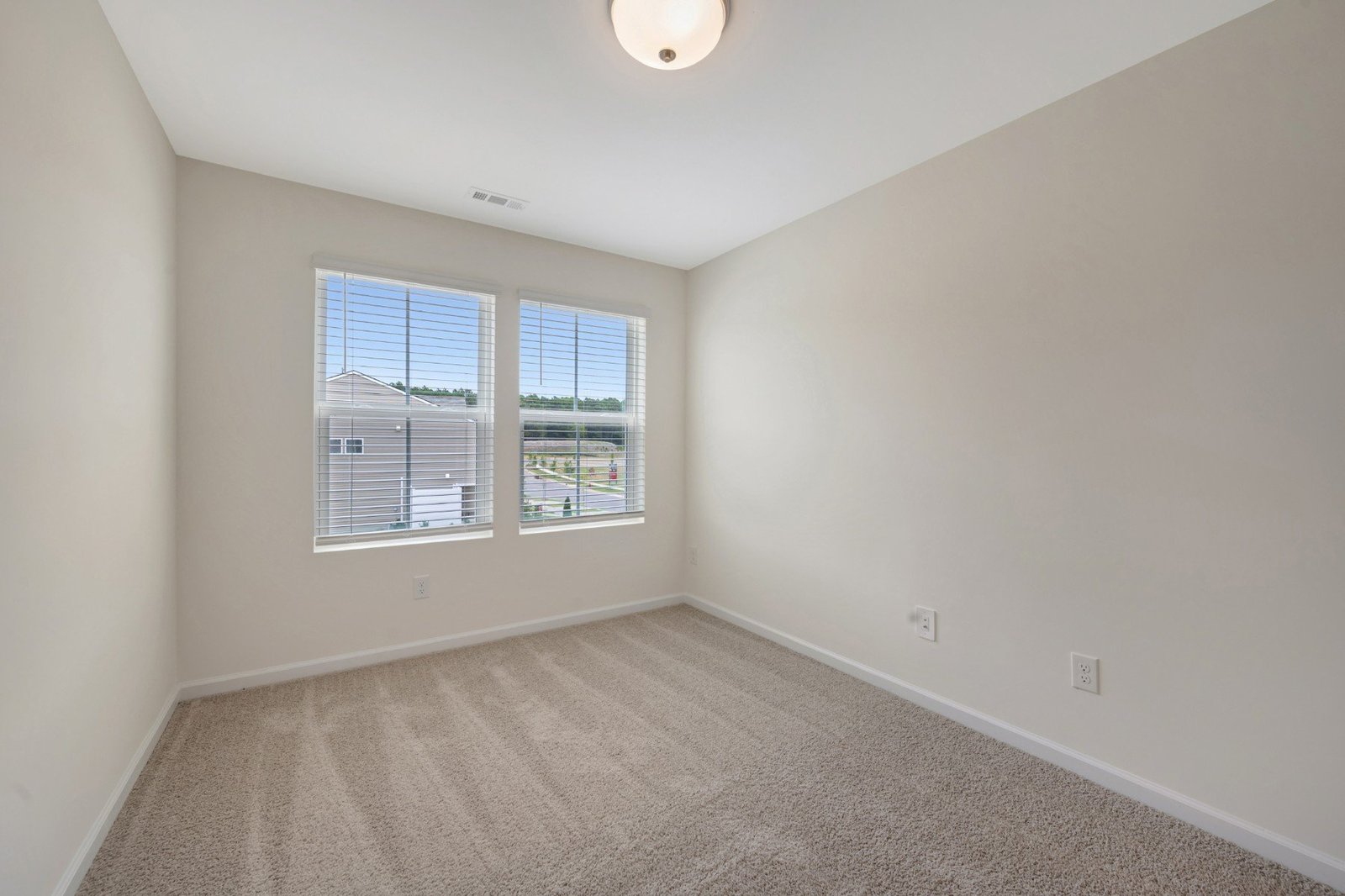 secondary bedroom with carpet