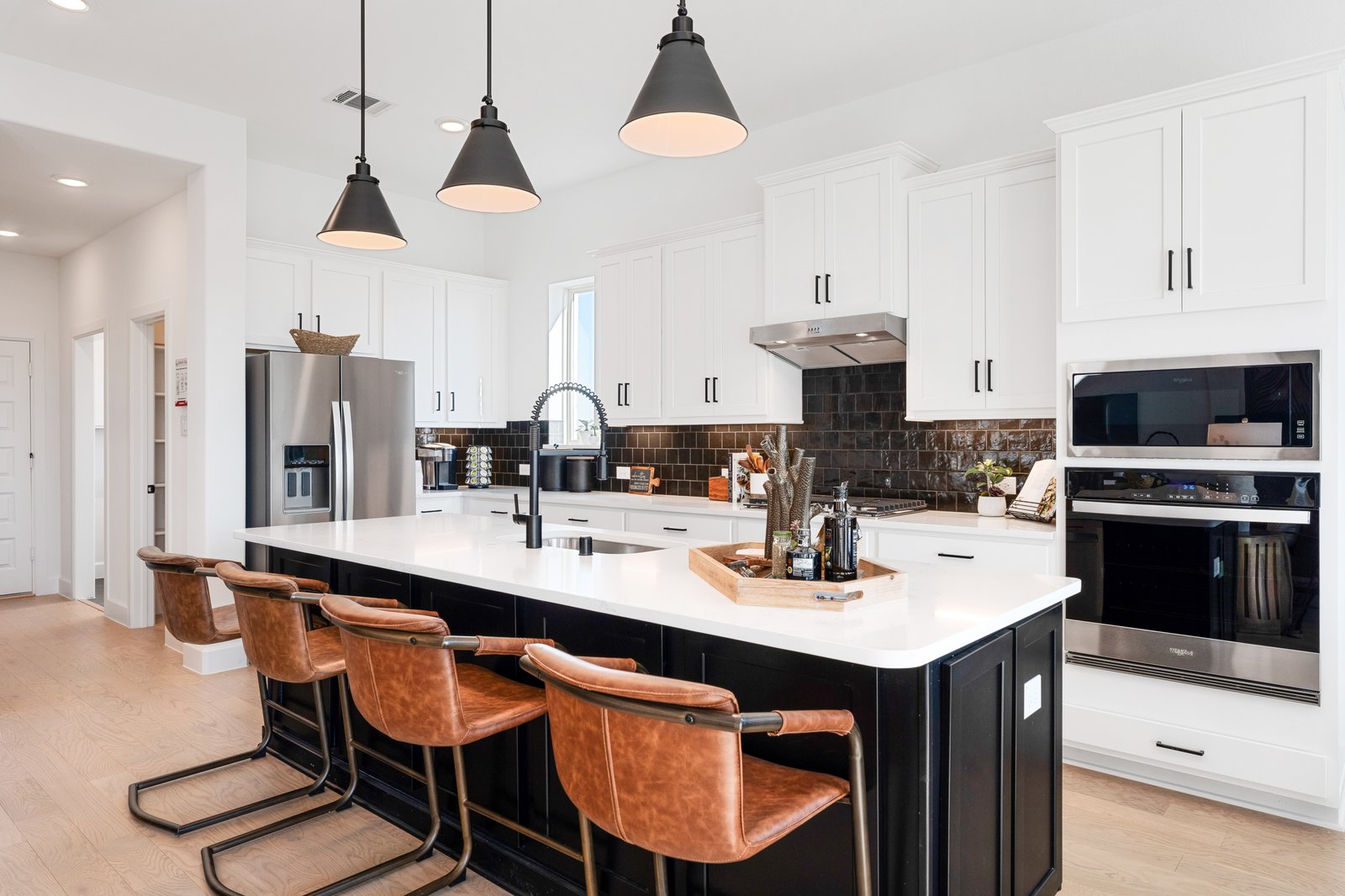 Kitchen with large island and white countertops