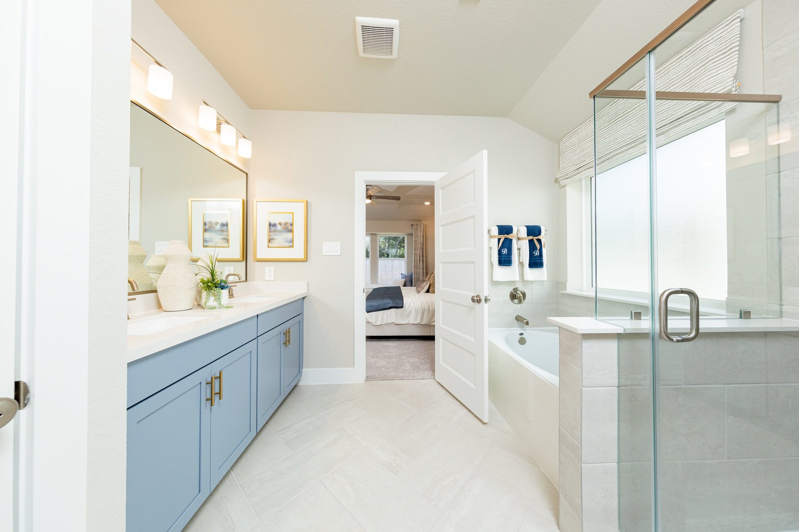 primary bathroom with seperate tub and walk-in shower