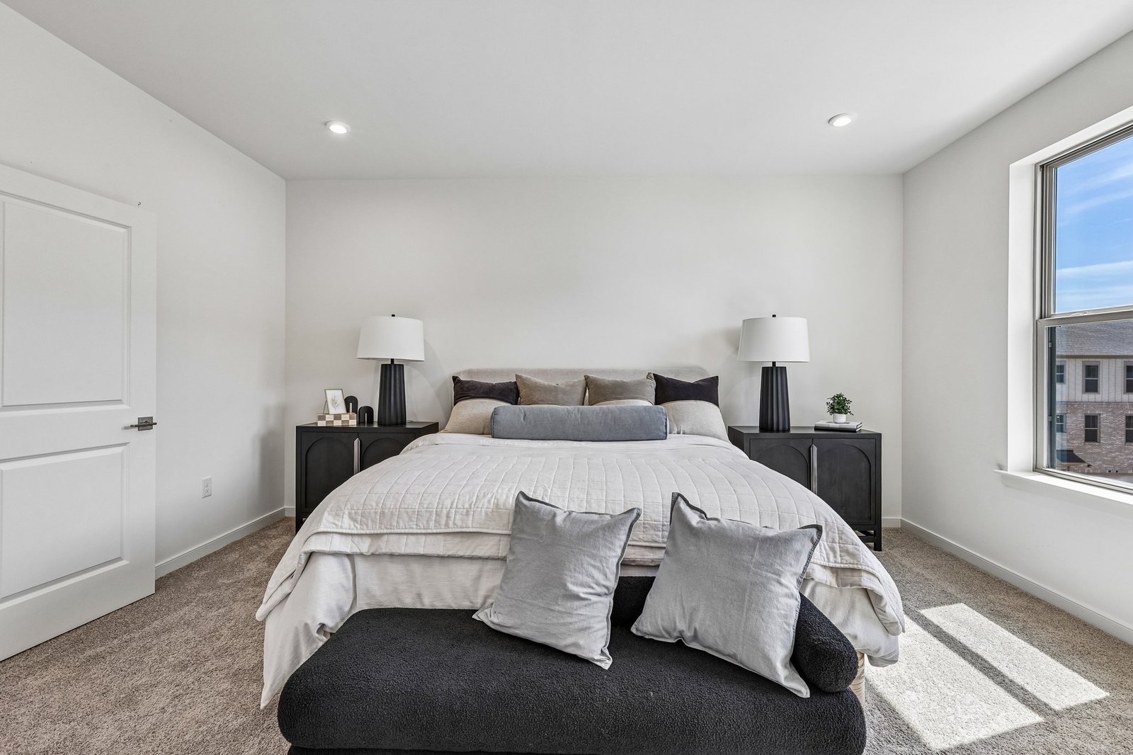 primary bedroom with carpet