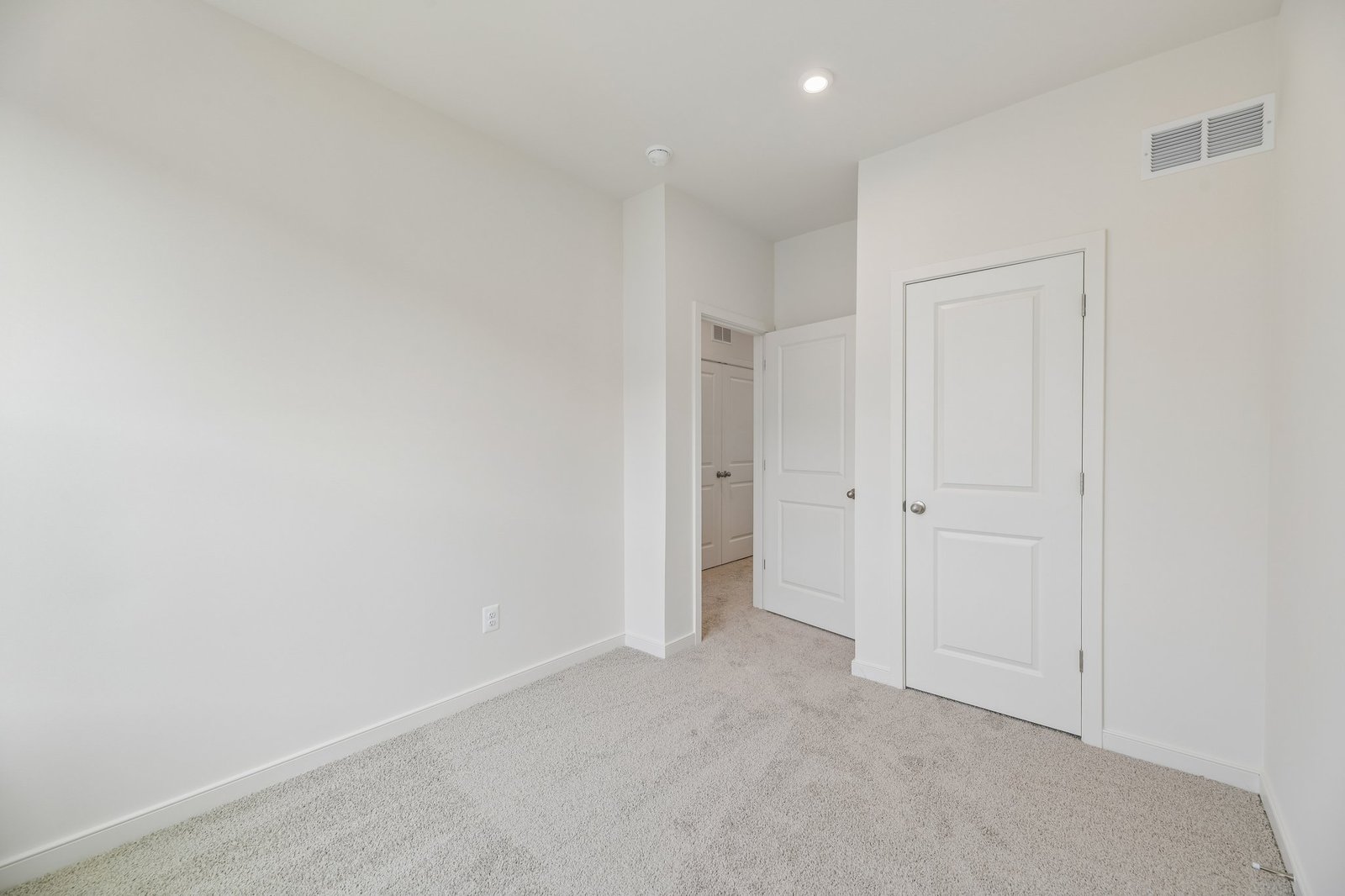 secondary bedroom with carpet