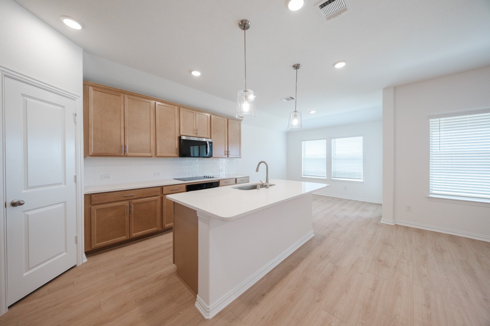 kitchen with large island and white countertops