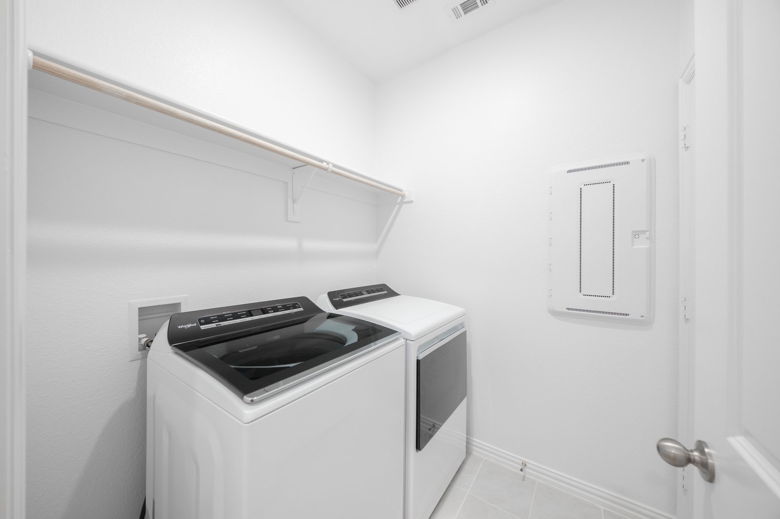 laundry room with washer and dryer