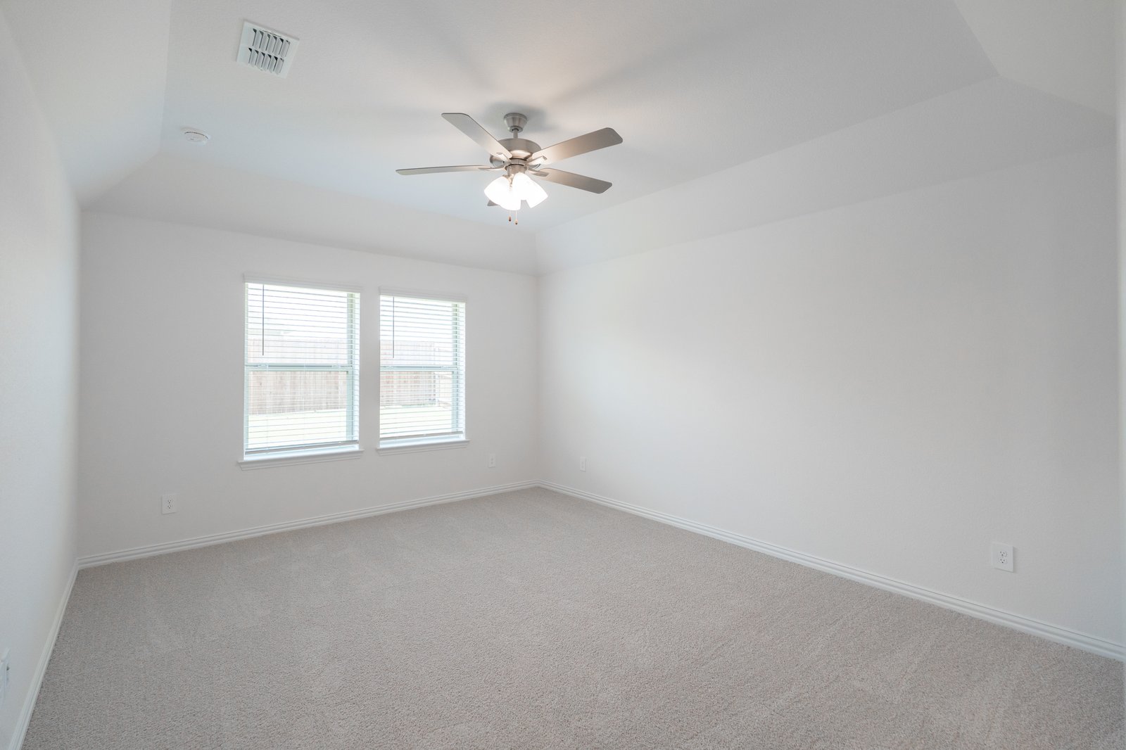 bedroom with carpet and ceiling fan