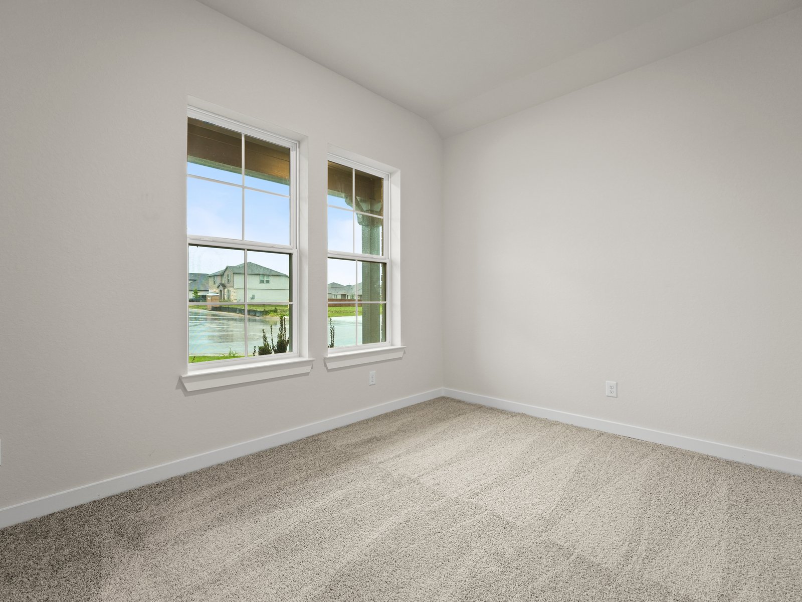 Study with carpet and two windows
