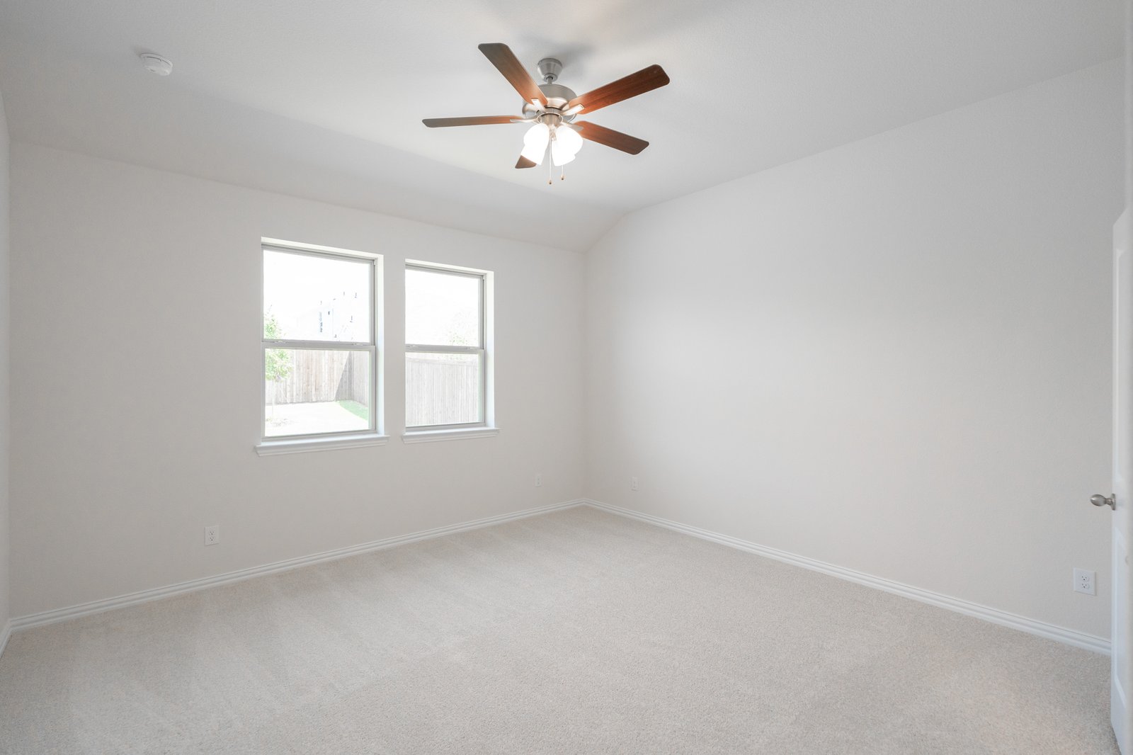 bedroom with carpet and ceiling fan 