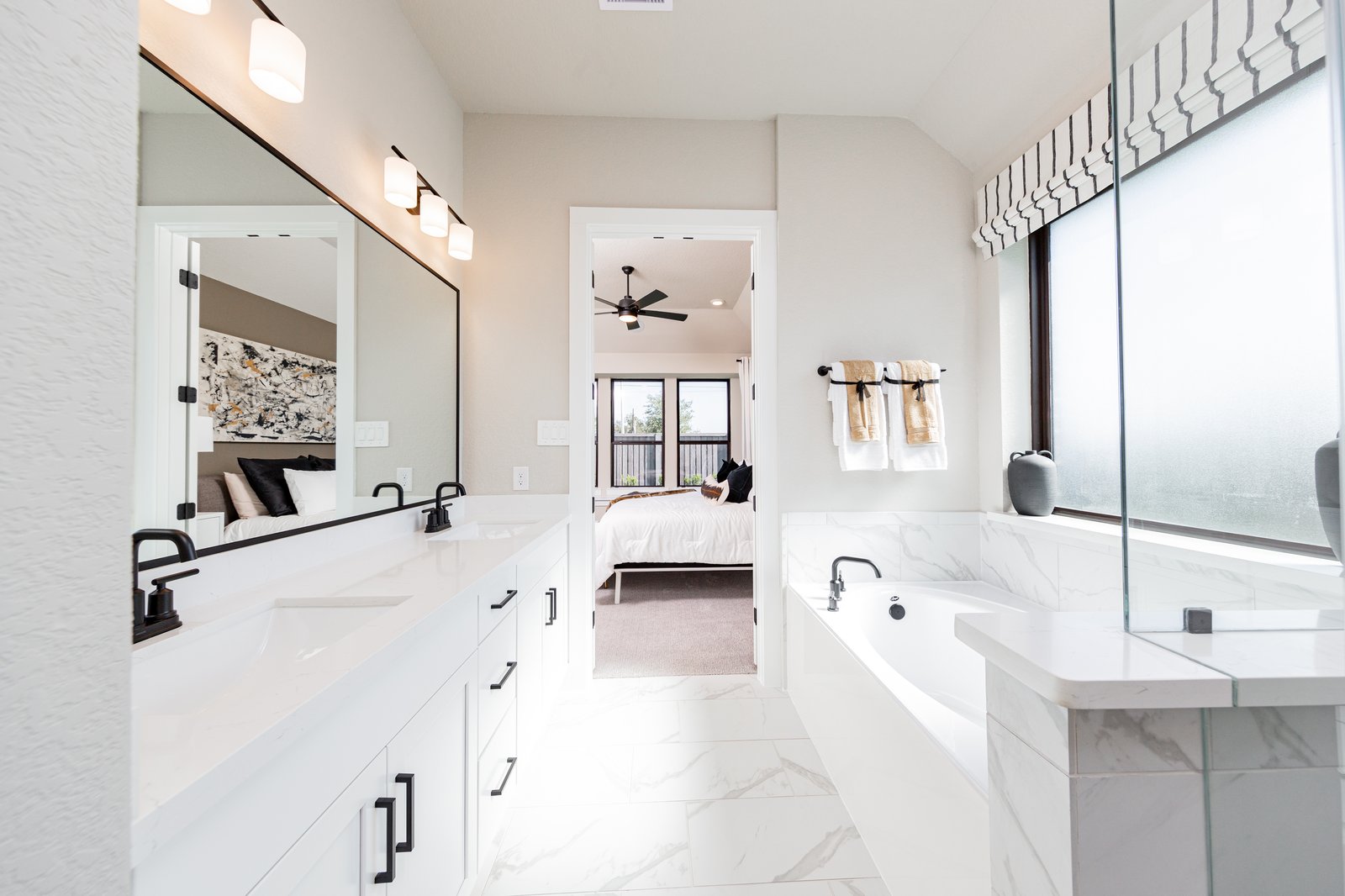 primary bathroom with soaking tub and shower