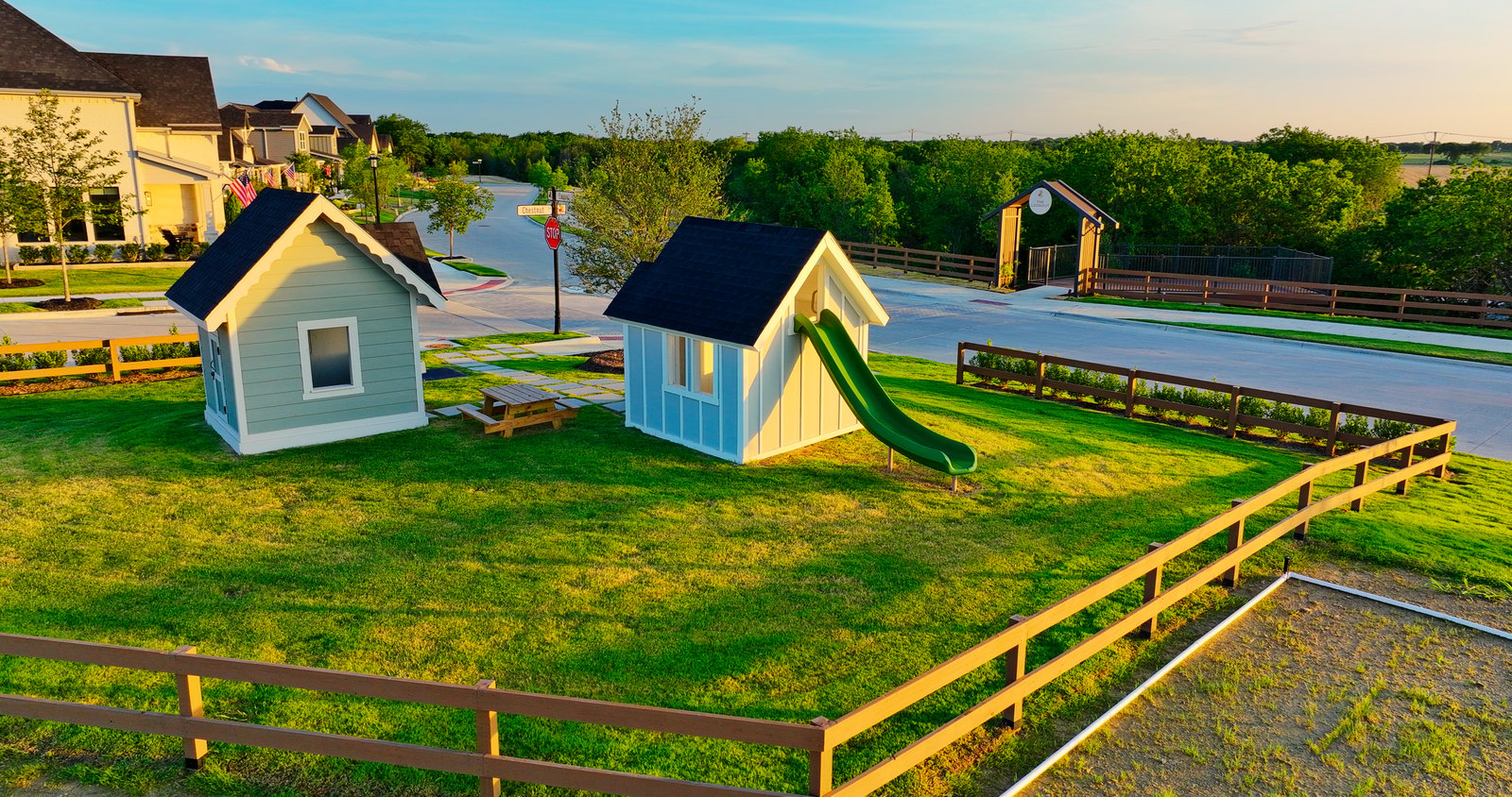view of park and playhouses