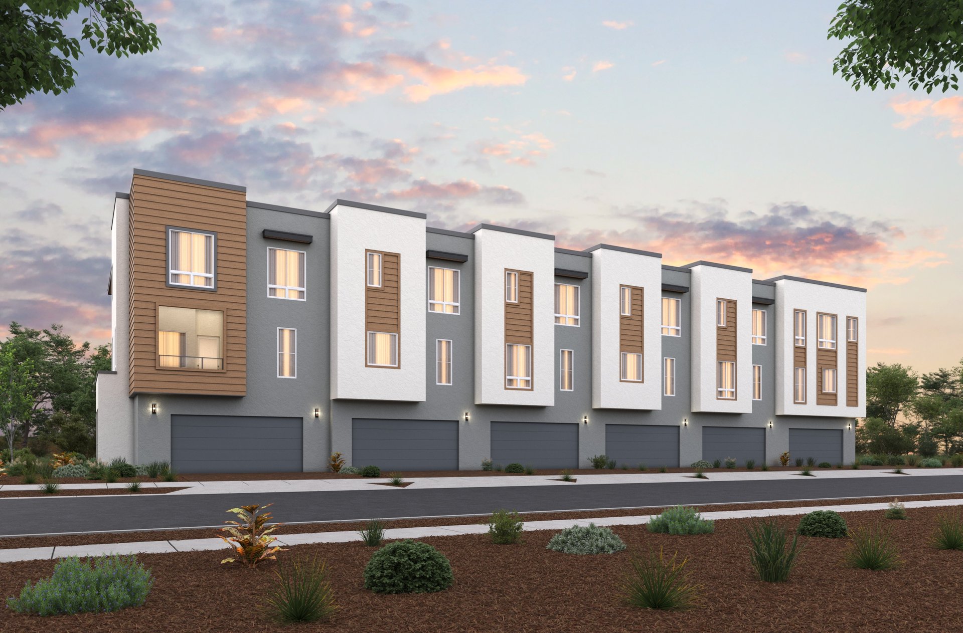 back exterior rendering of 3-story gray and white condo building with attached garages