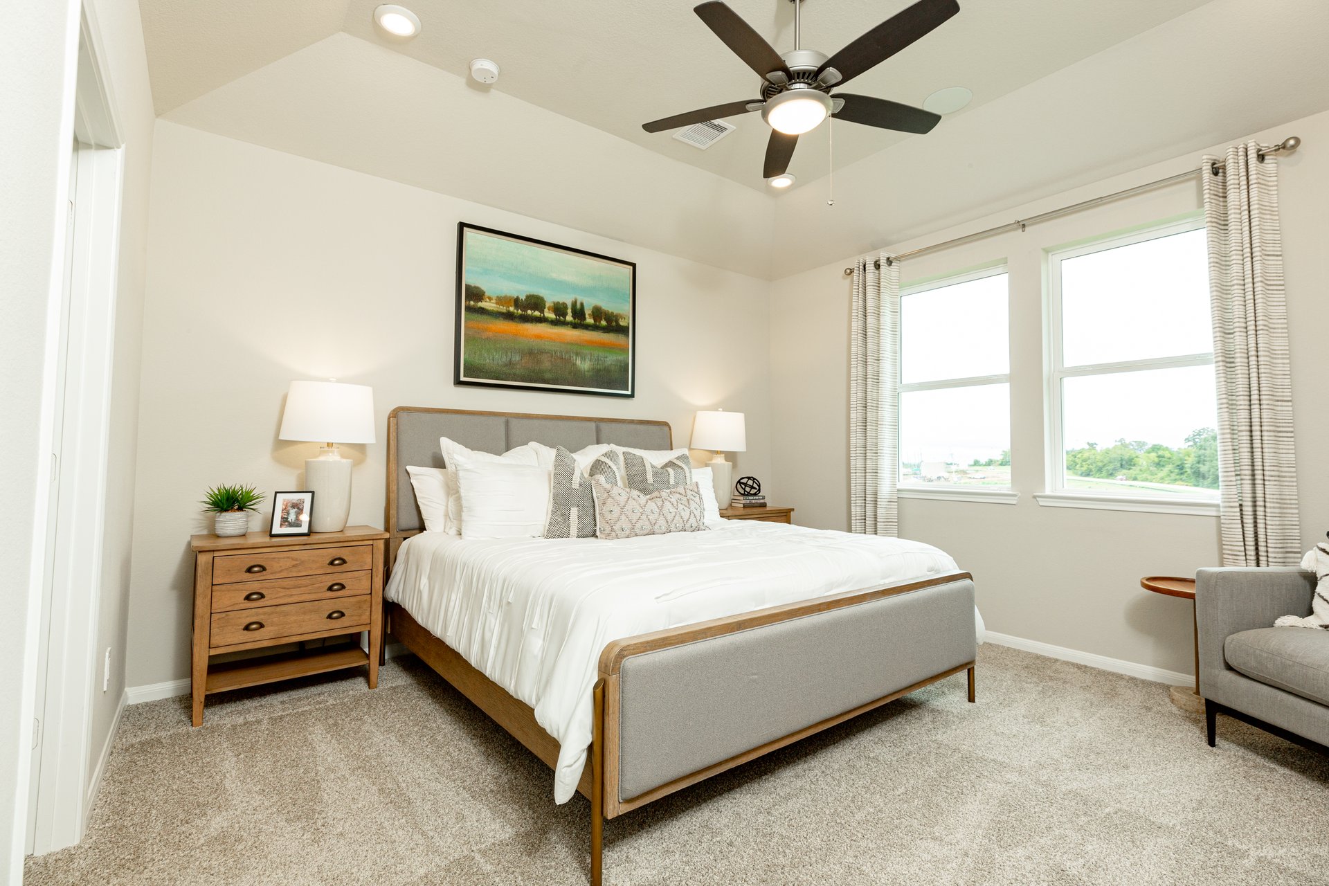 bedroom with 3 windows