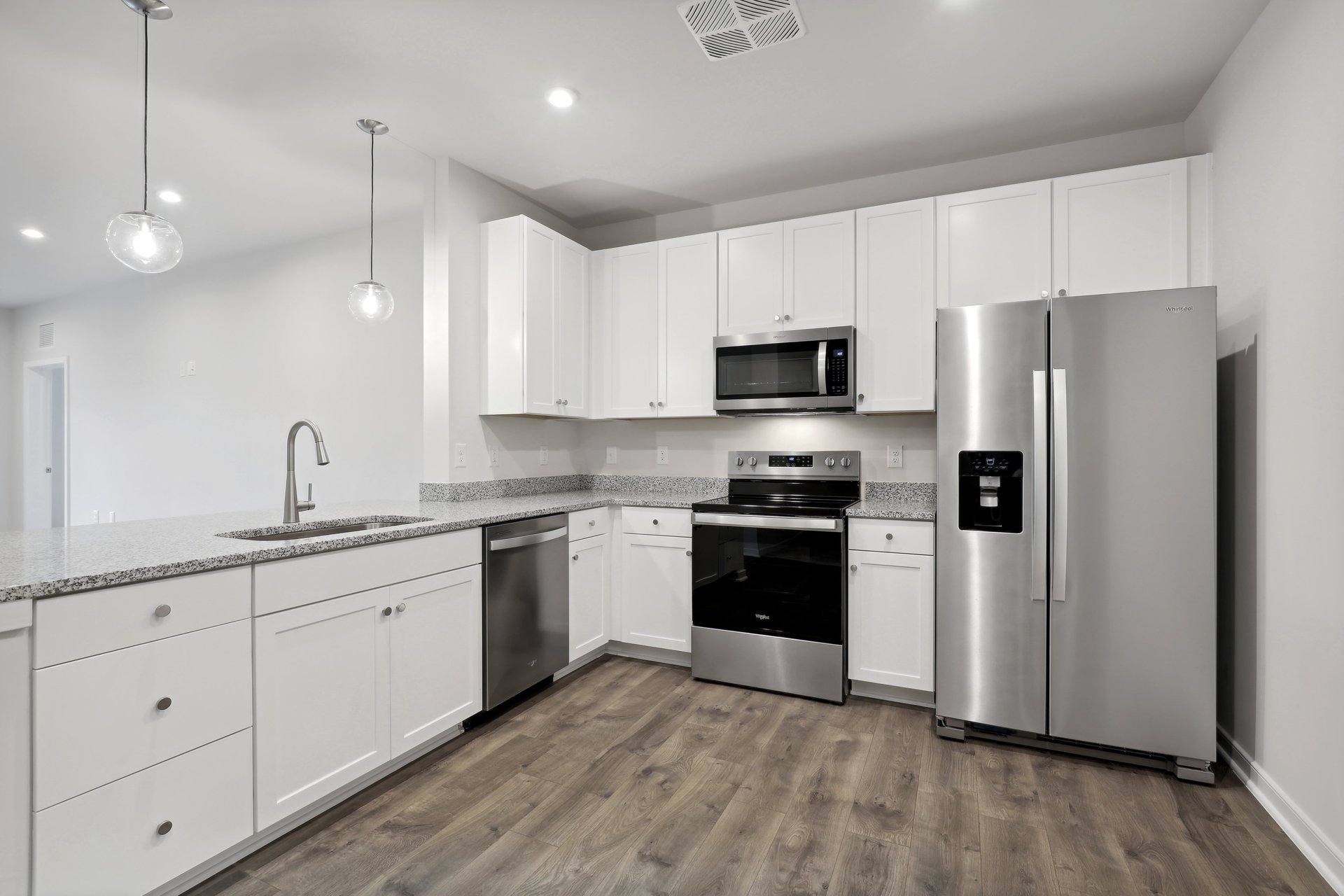 kitchen with quartz countertops and stainless steel appliances