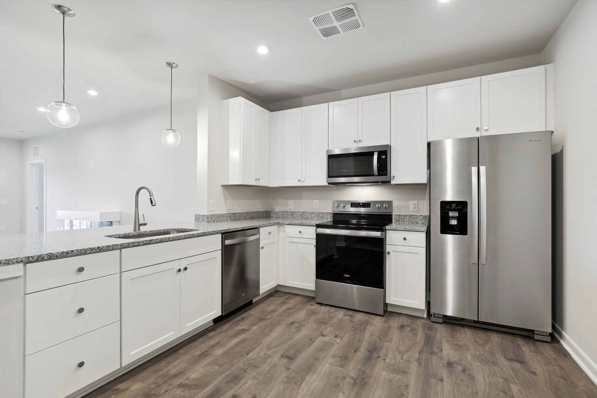 kitchen with quartz countertops and stainless steel appliances