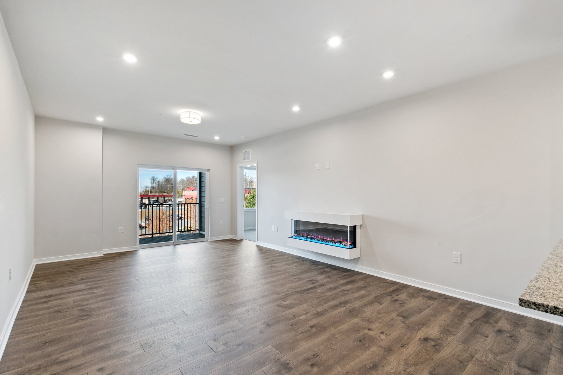 dining room with fireplace and overhead lighting