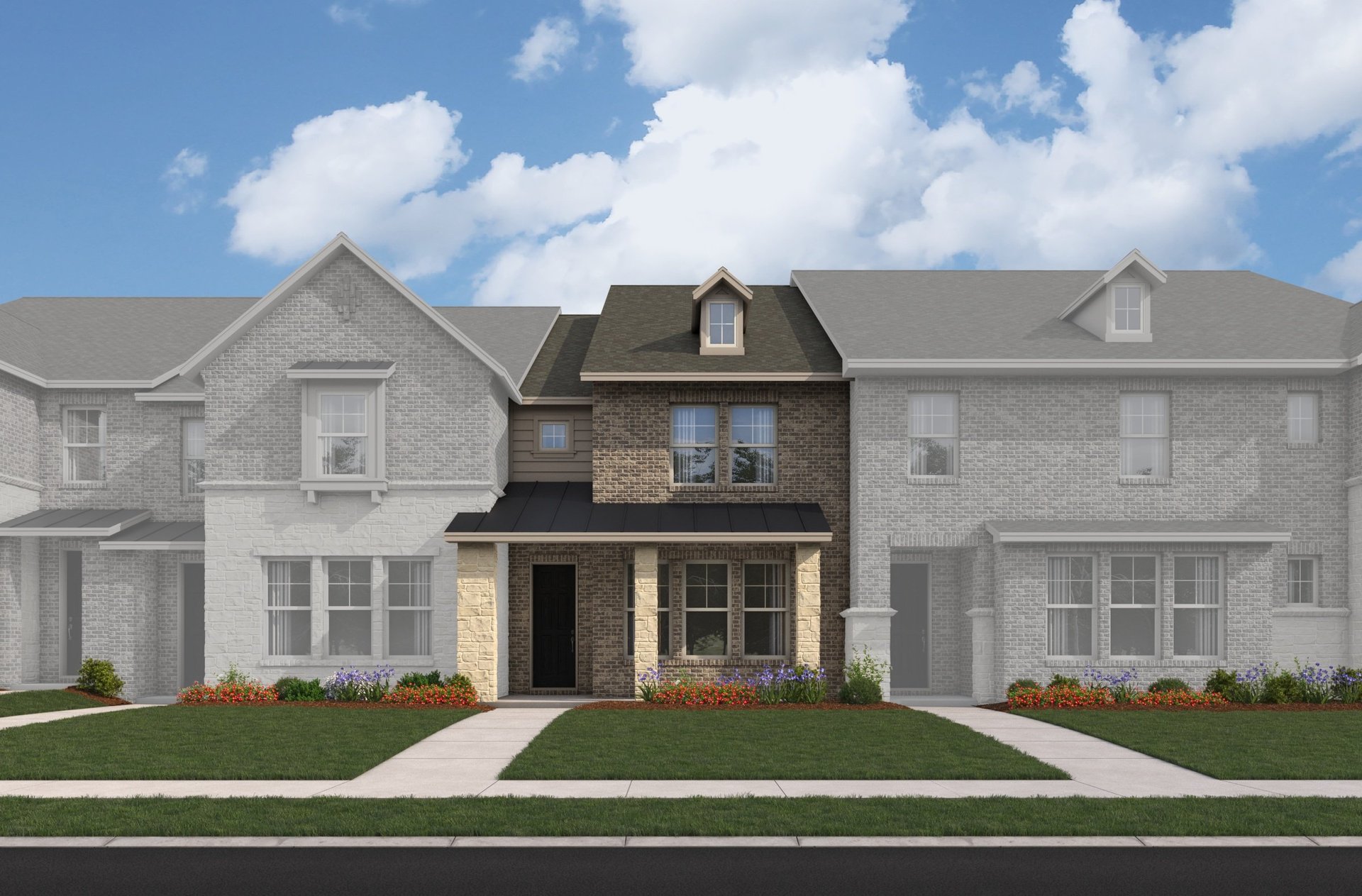 two-story townhome exterior with brick and stone