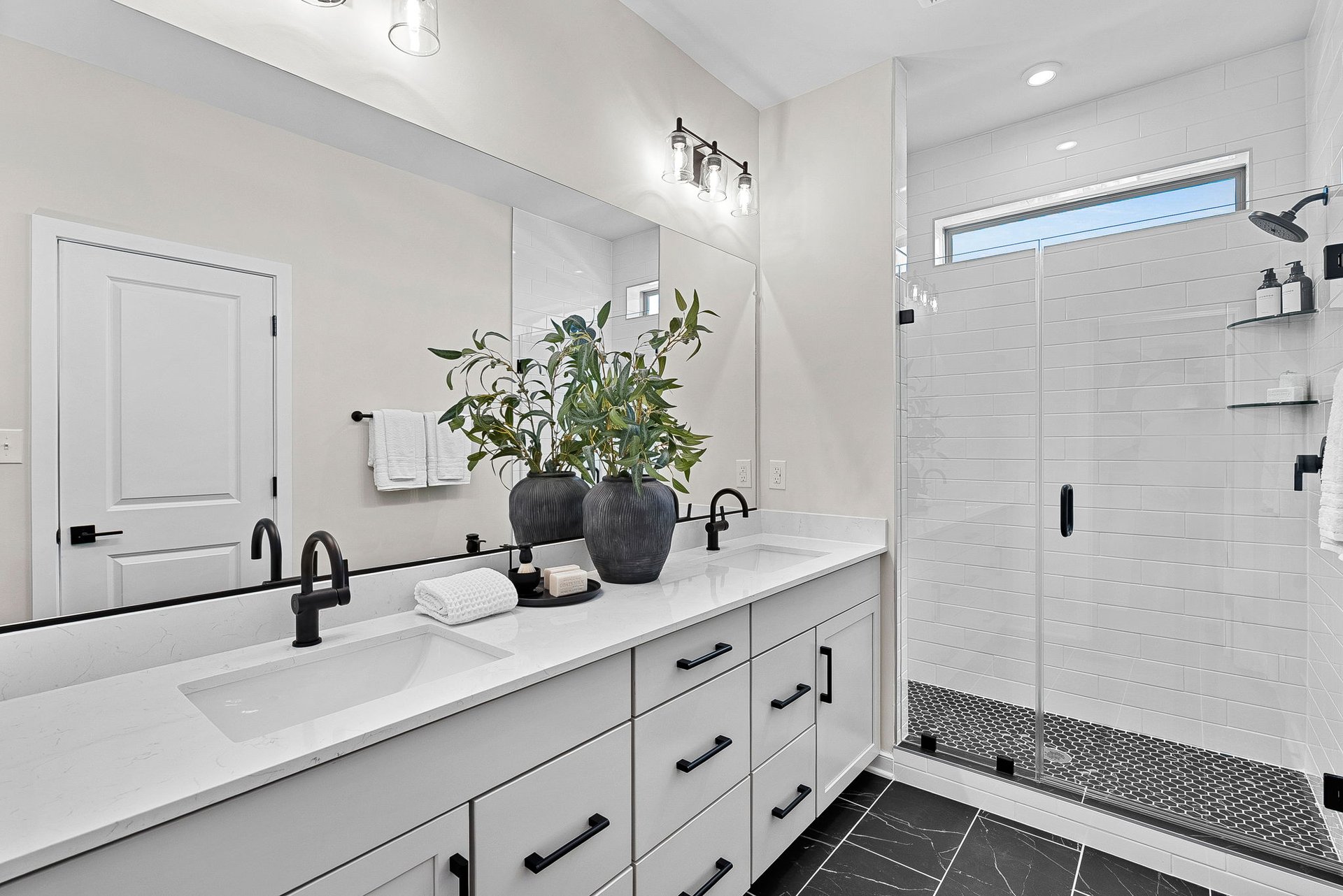 primary bathroom with an oversized shower