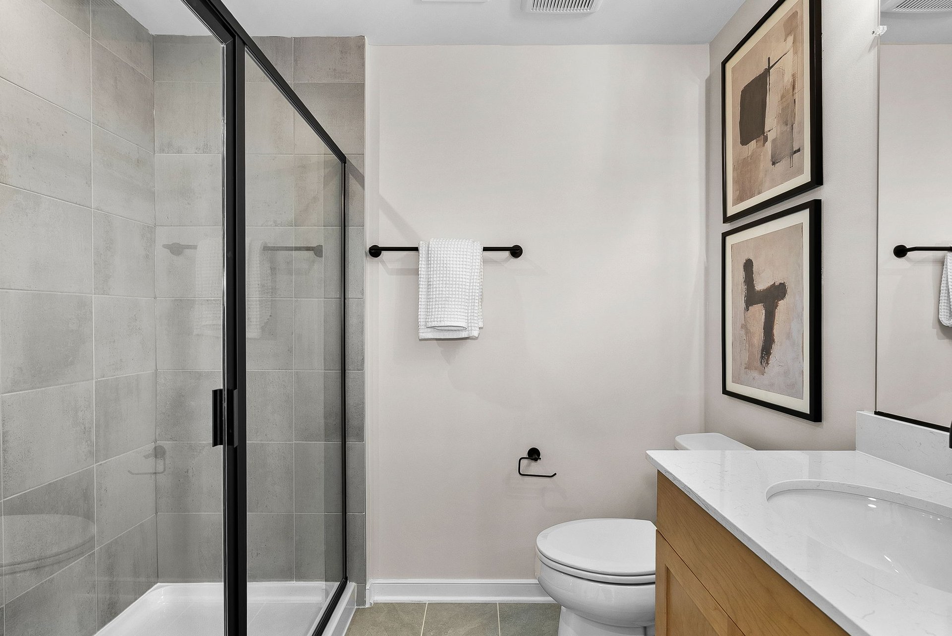 secondary bathroom with an oversized shower
