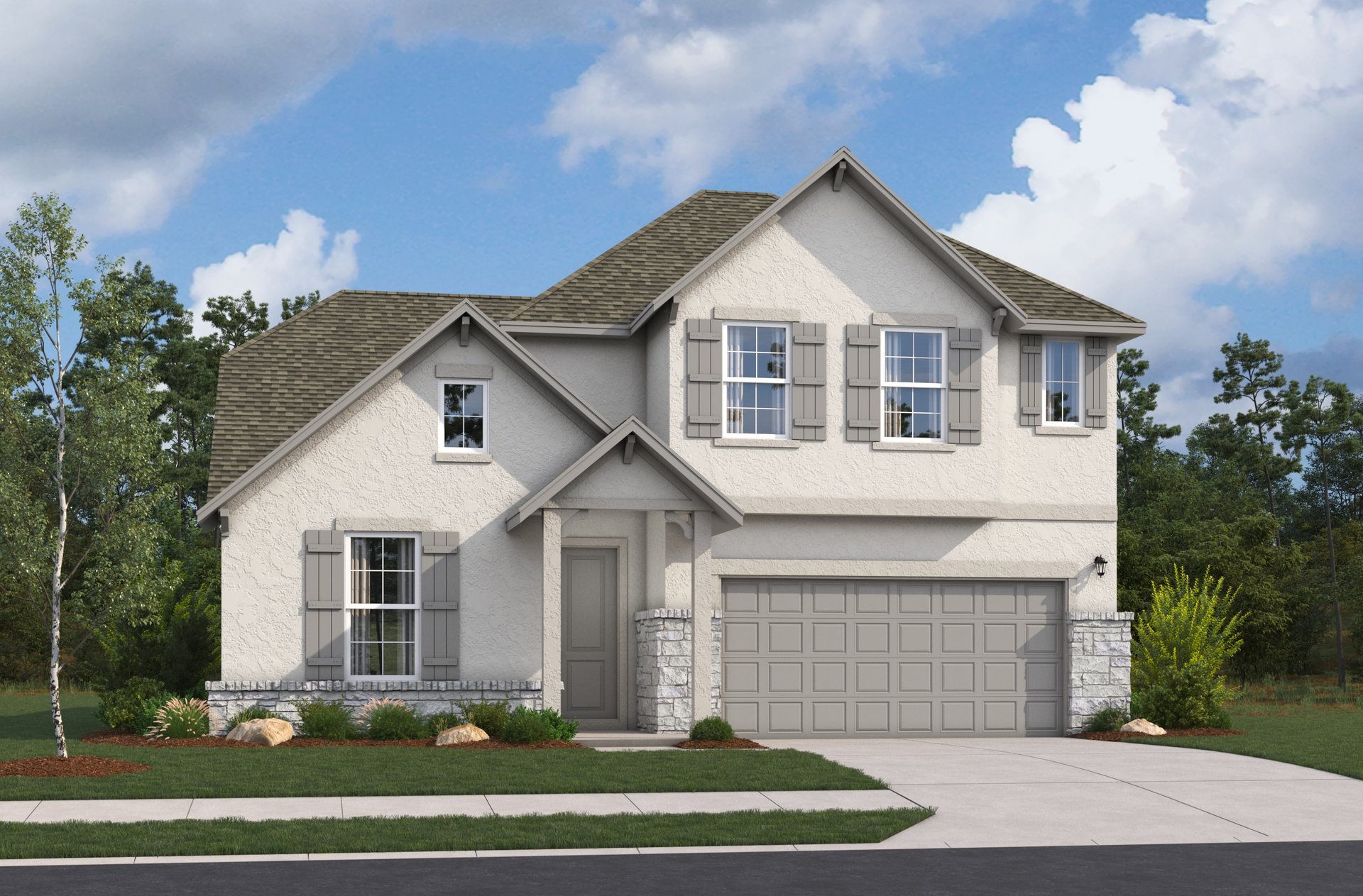 exterior with grass, trees & a 2-car garage