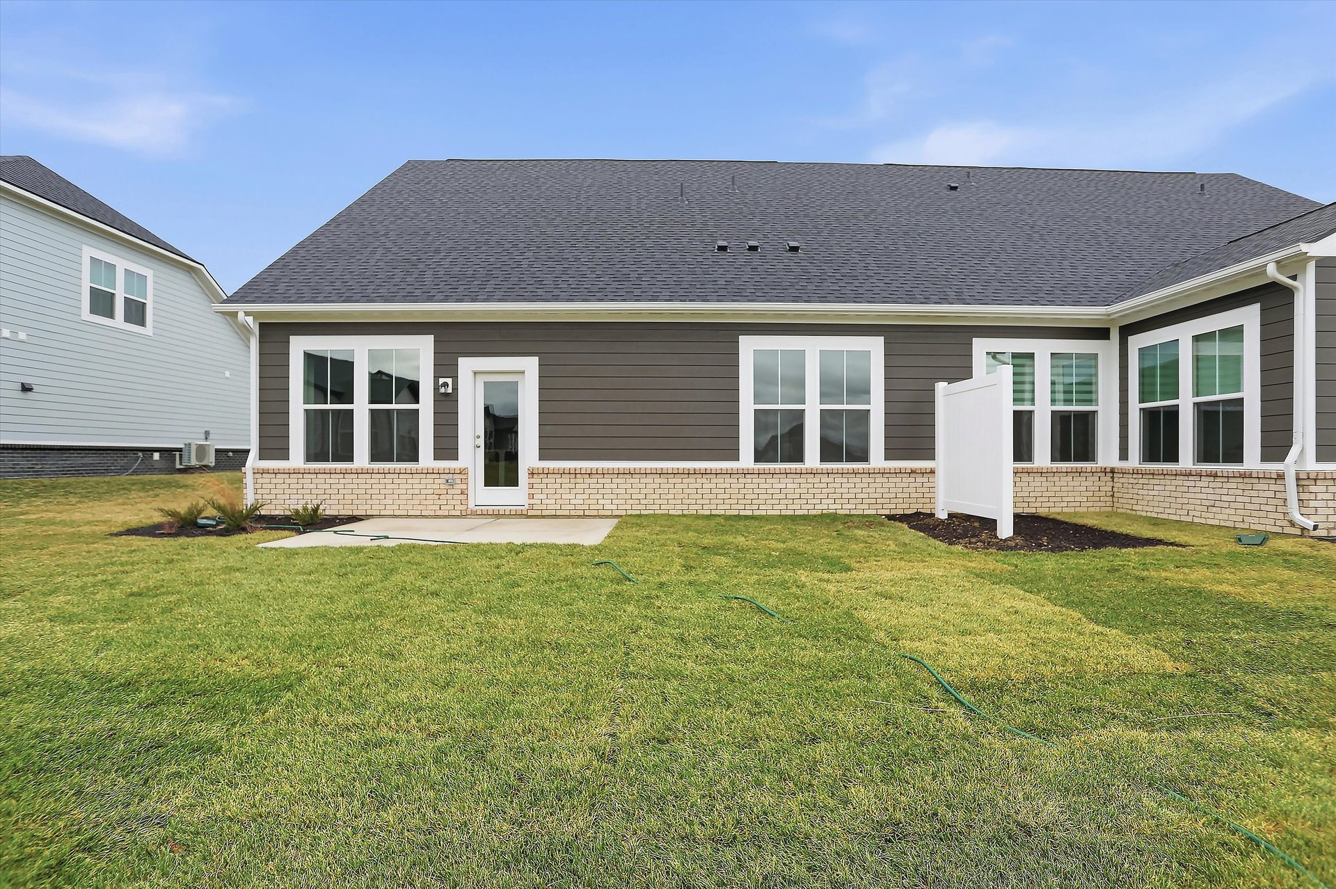 back exterior of home with patio
