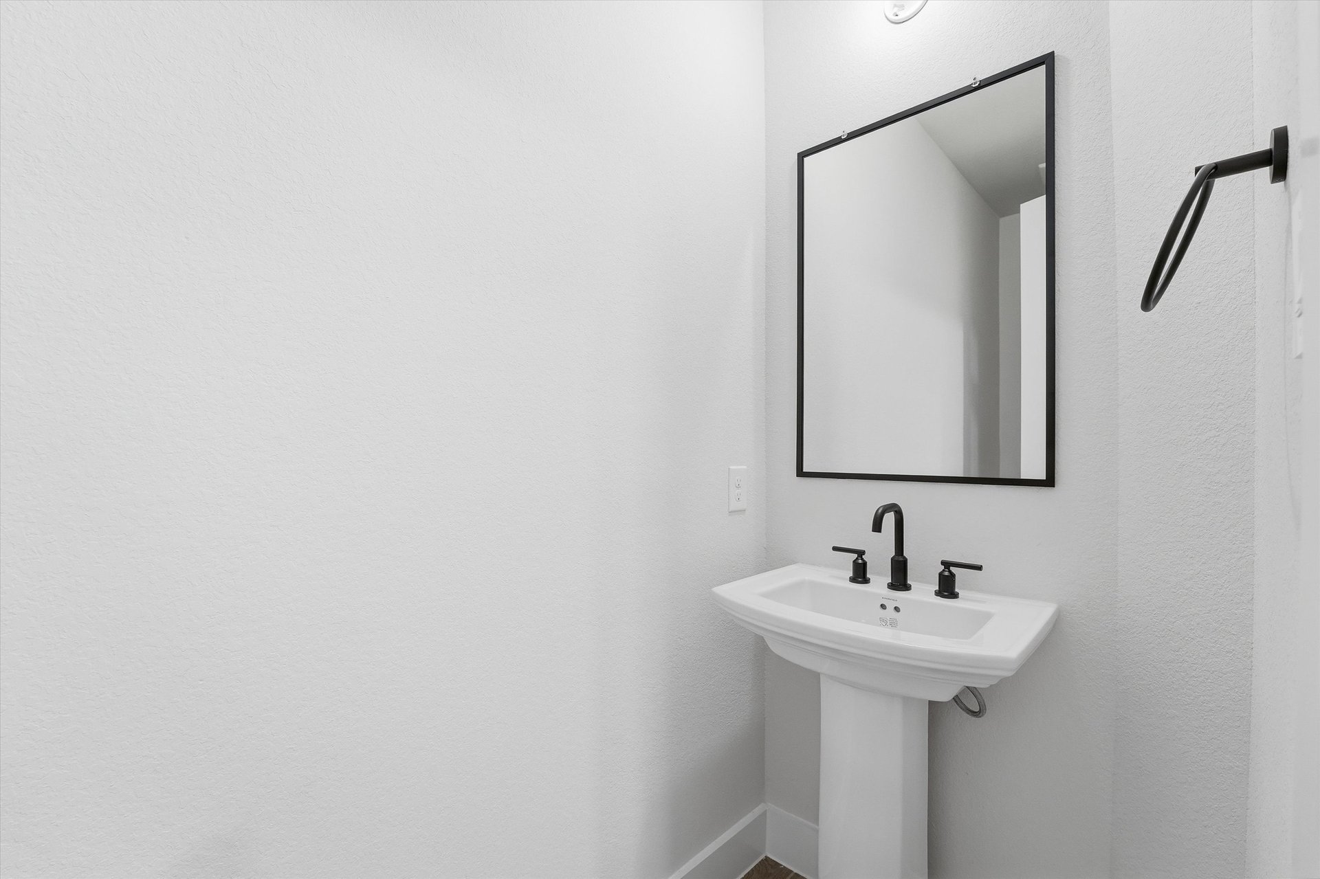 powder bathroom with pedestal sink
