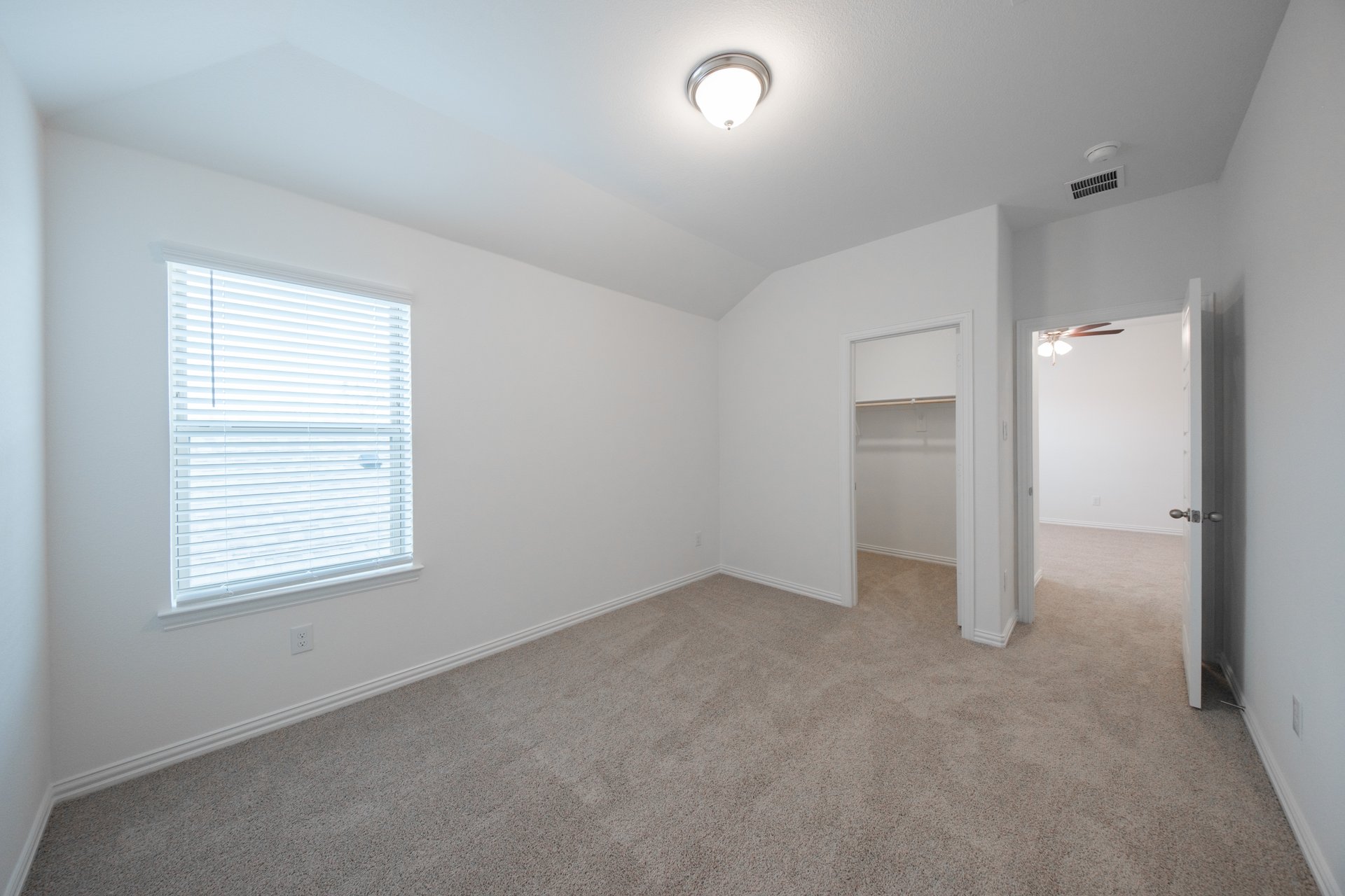 guest bedroom with carpet