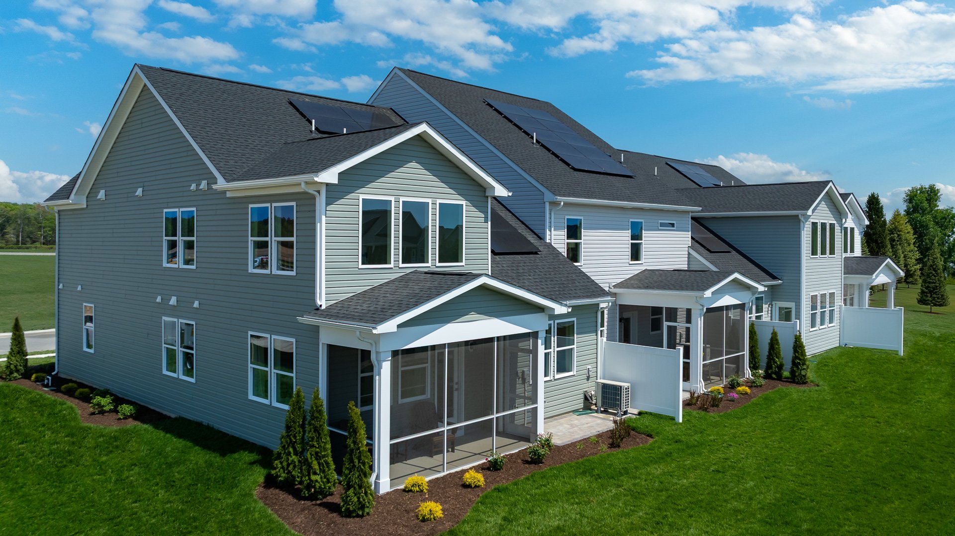 rear exterior with a screend-in porch