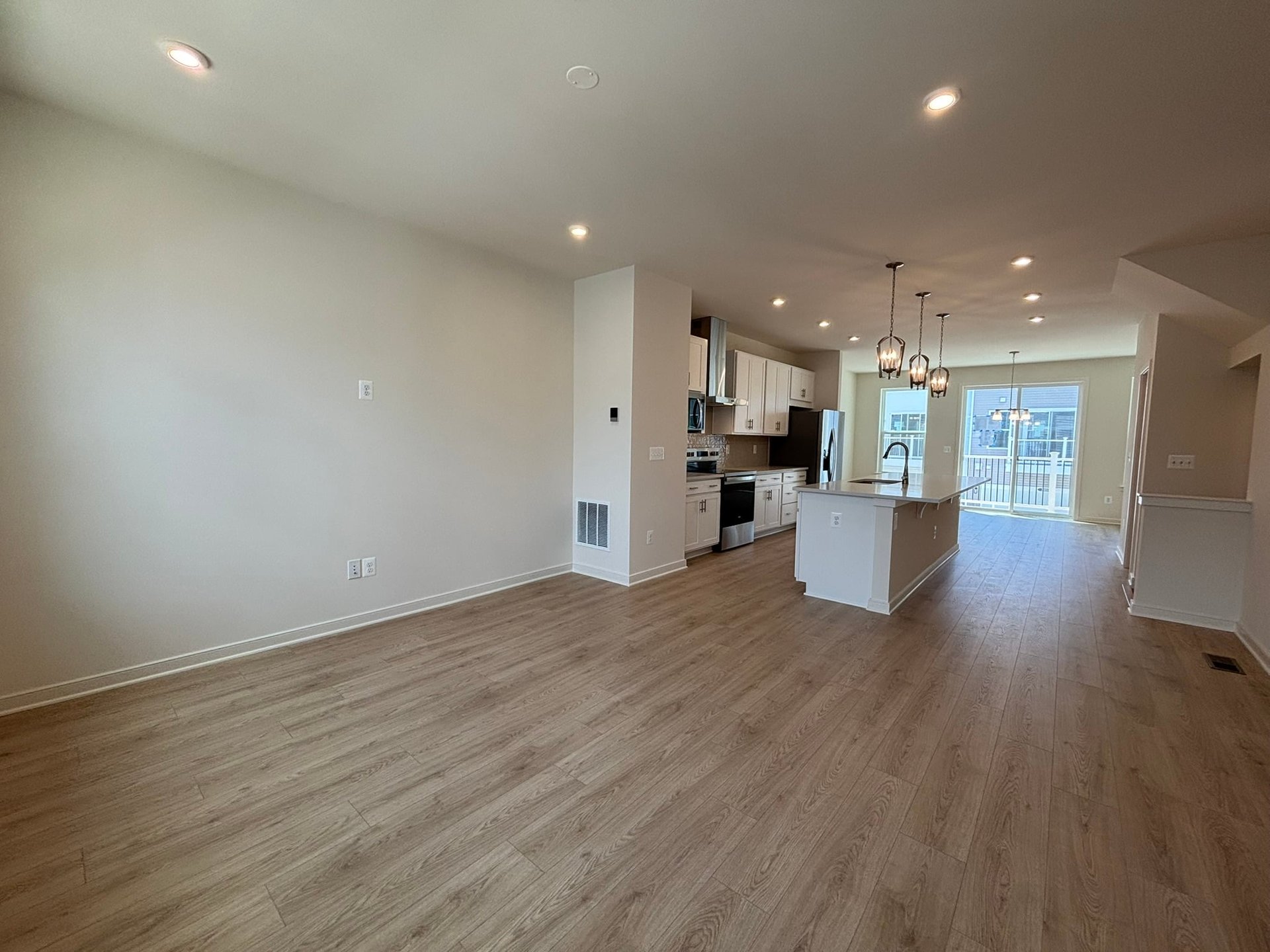 great room with access to the kitchen