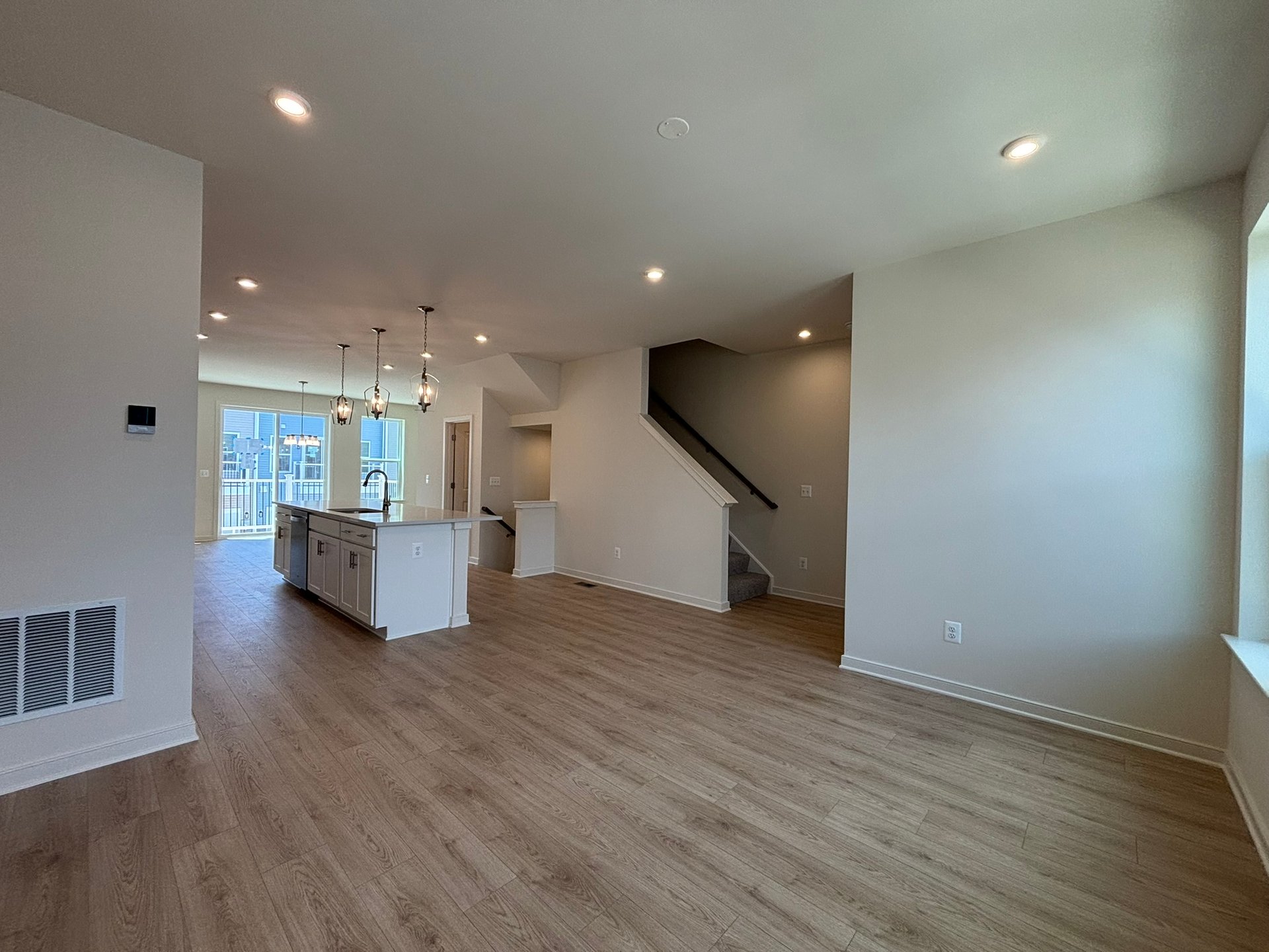 great room with access to the kitchen