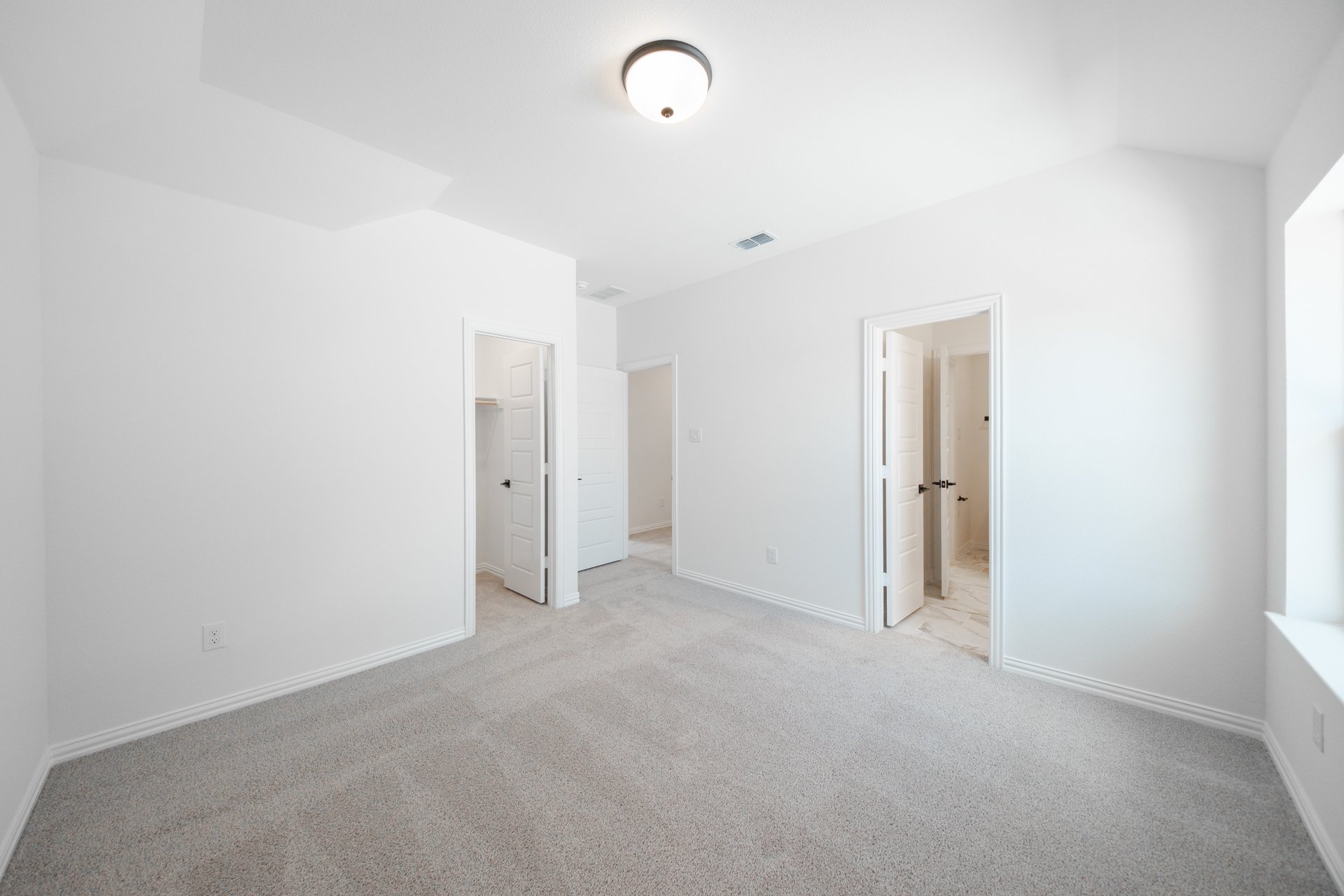 guest bedroom with carpet