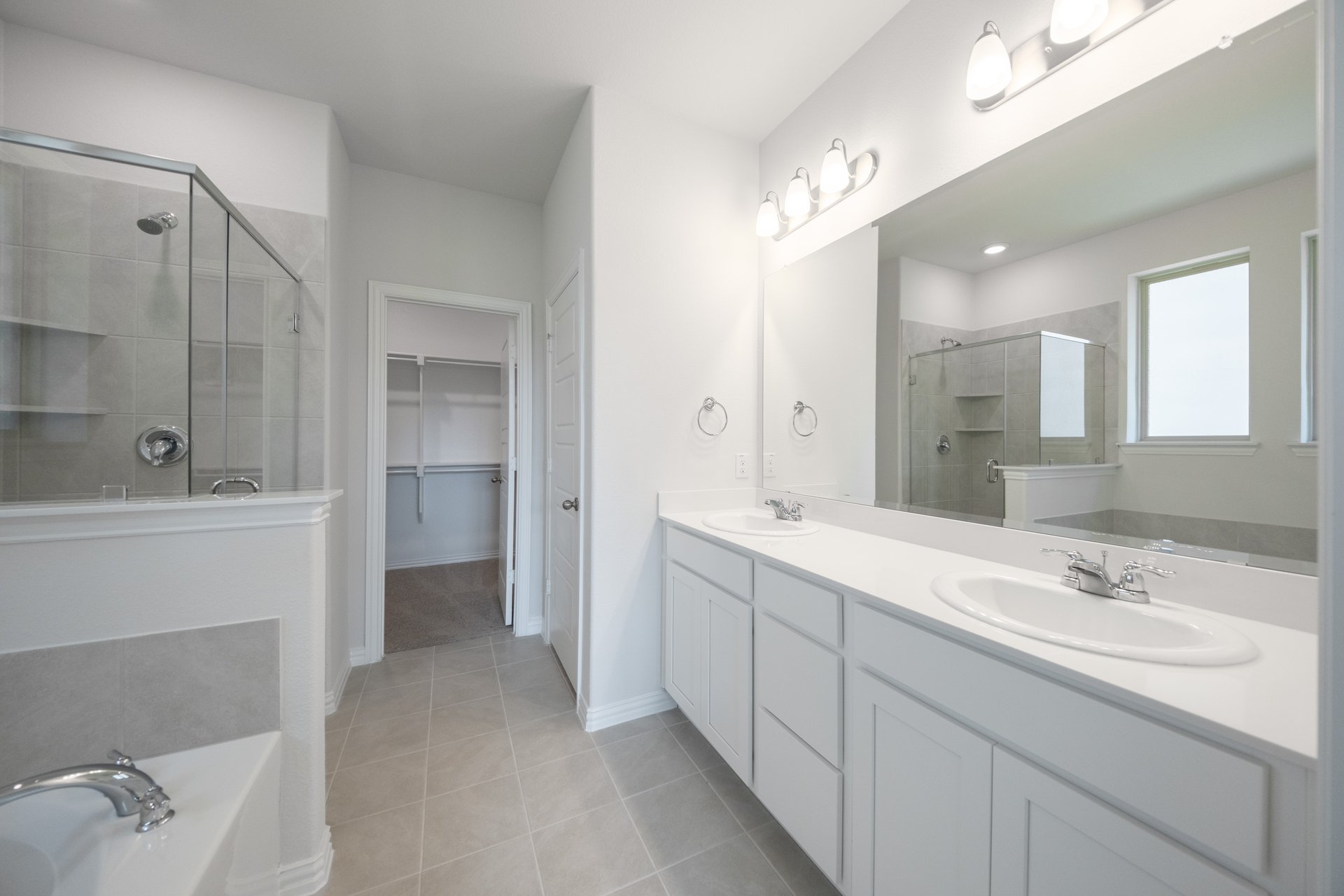 large primary bathroom with double sinks